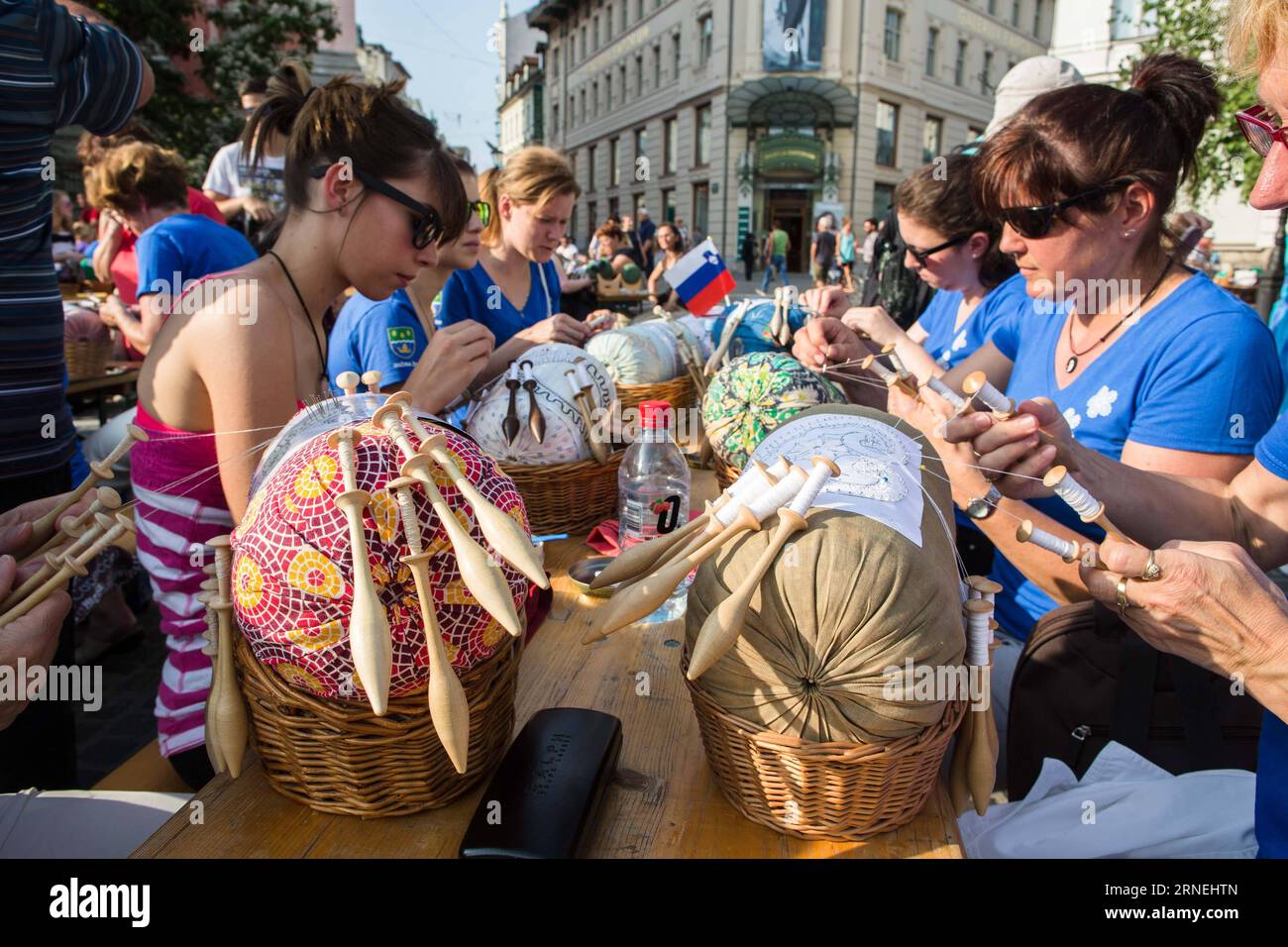 LJUBLJANA, June 23, 2016 -- Women make lace during a lacemaking event marking the beginning of the 17th OIDFA (international lace organization) World Lace Congress and General Assembly in Ljubljana, Slovenia, June 23, 2016. Nearly a thousand lace makers from all over the world attended the event on Friday.) (yy) SLOVENIA-LJUBLJANA-LACEMAKING LukaxDakskobler PUBLICATIONxNOTxINxCHN   Ljubljana June 23 2016 Women Make Lace during a lacemaking Event marking The BEGINNING of The 17th  International Lace Organization World Lace Congress and General Assembly in Ljubljana Slovenia June 23 2016 parishi Stock Photo