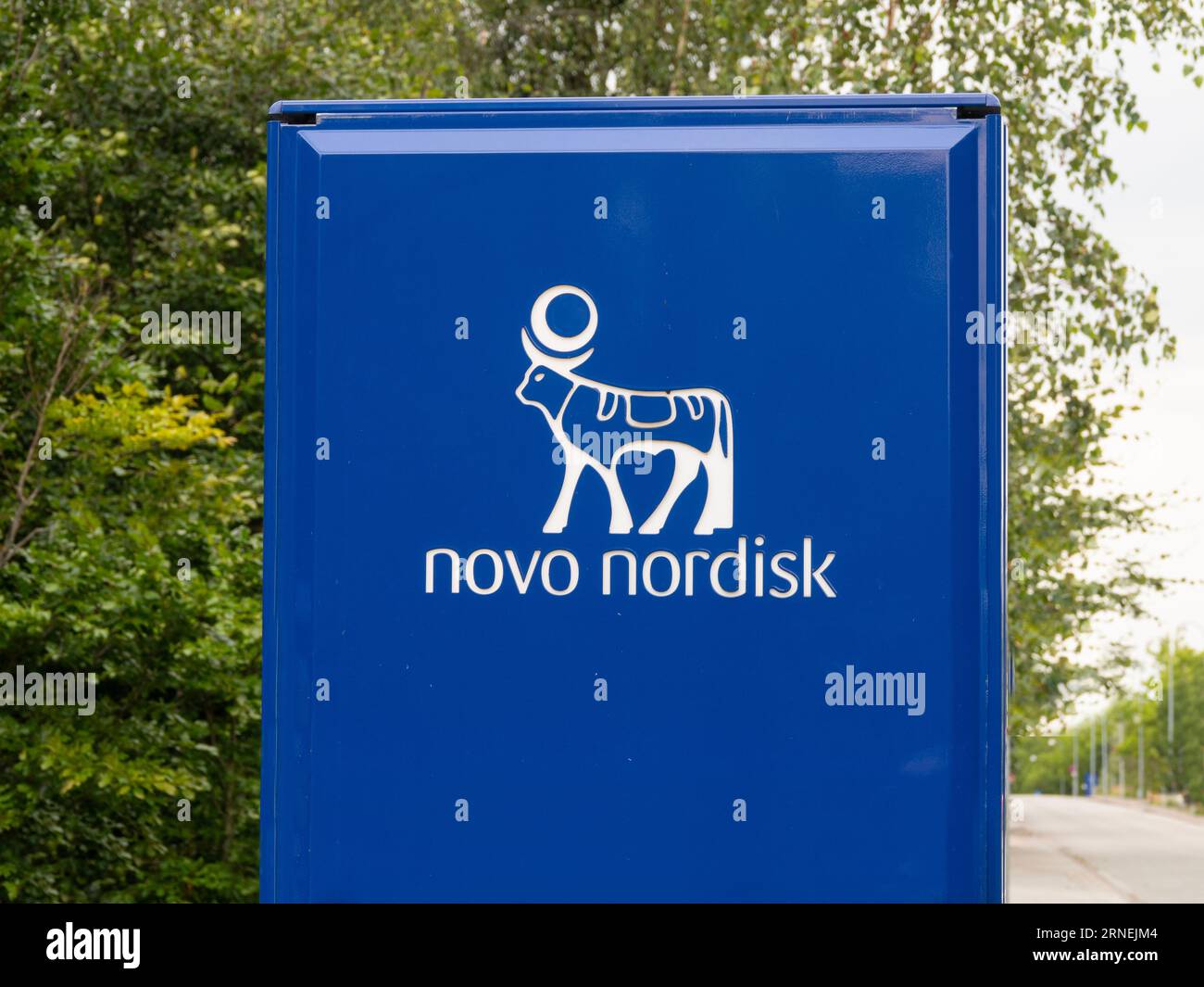 Signpost with logotype at Novo Nordisk corporate headquarters. A pharmaceutical company headquartered in Denmark. Copenhagen, Denmark - august 12, 202 Stock Photo
