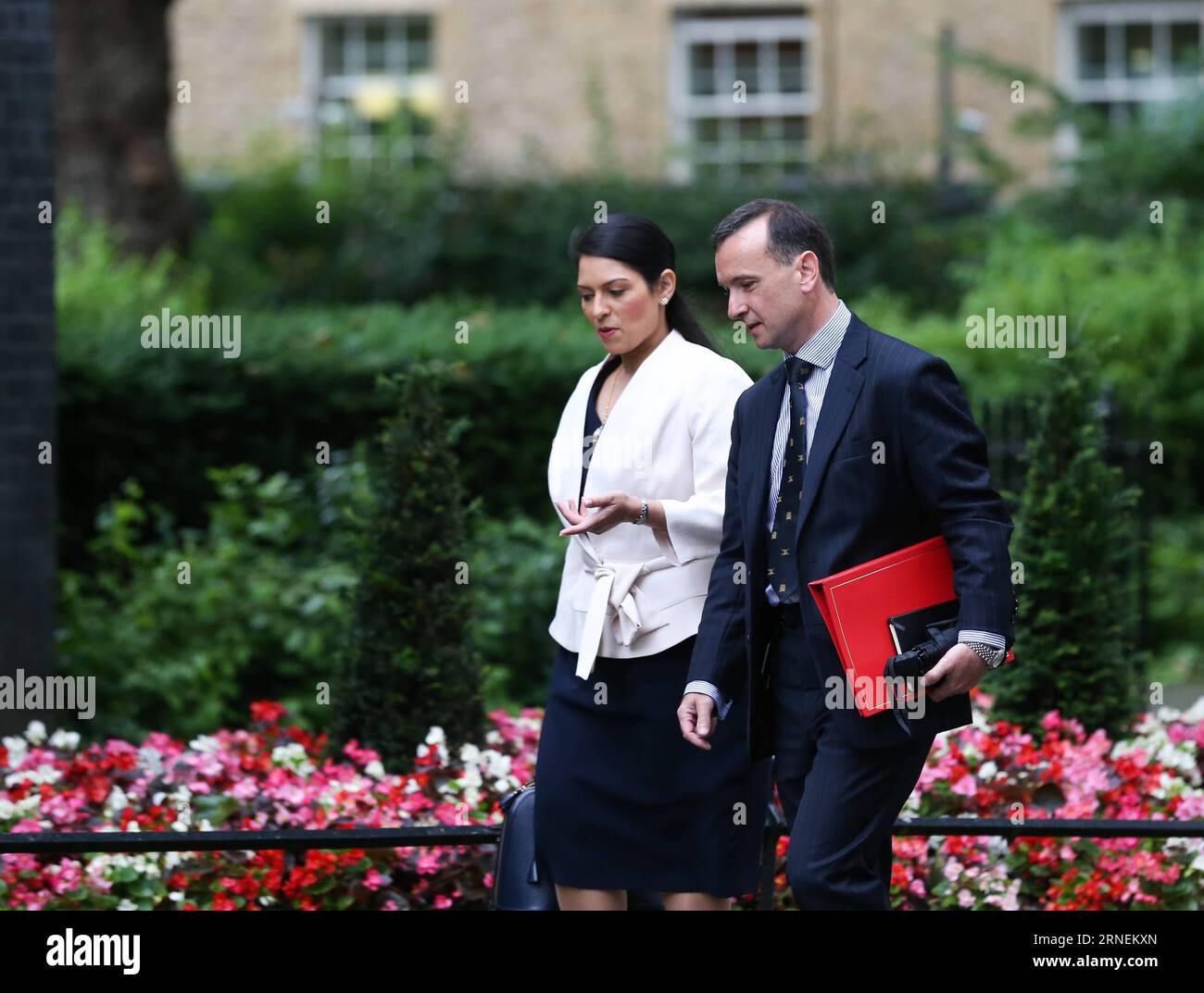 (160627) -- LONDON, June 27, 2016 -- Priti Patel (L), Minister of State for Employment, and Alun Cairns, Secretary of State for Wales, arrive for a cabinet meeting at 10 Downing Street in London, Britain, June 27, 2016. British Prime Minister David Cameron chaired an emergency cabinet meeting on Monday morning, after Britain had voted to leave the European Union. ) (zjy) BRITAIN-LONDON-BREXIT-CABINET MEETING HanxYan PUBLICATIONxNOTxINxCHN   160627 London June 27 2016 Priti Patel l Ministers of State for Employment and Alun Cairns Secretary of State for Wales Arrive for a Cabinet Meeting AT 10 Stock Photo