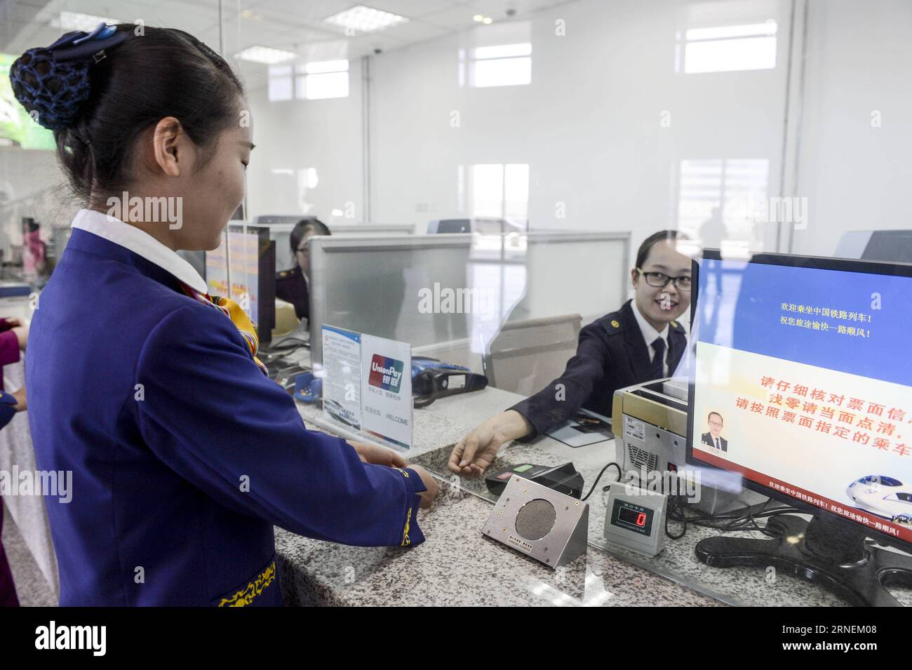 (160627) -- URUMQI, June 27, 2016 -- Working staff prepare for trial operation by a ticket window at a new railway station for high-speed rails in Urumqi, capital of northwest China s Xinjiang Uygur Autonomous Region, June, 27, 2016. There are 12 ticket windows at the station. The station will be put into trial operation on July 1. ) (mp) CHINA-XINJIANG-URUMQI-RAILWAY STATION-TRIAL OPERATION (CN) WangxFei PUBLICATIONxNOTxINxCHN   160627 Urumqi June 27 2016 Working Staff prepare for Trial Operation by a Ticket Window AT a New Railway Station for High Speed Rails in Urumqi Capital of Northwest C Stock Photo