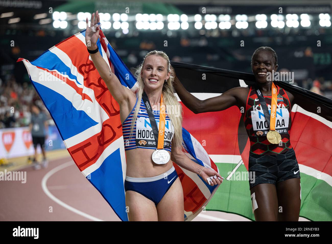 Keely Hodgkinson Celebrating Her Medal With Her Country s Flag In The Keely Hodgkinson Celebrating Her Medal With Her Country s Flag In The