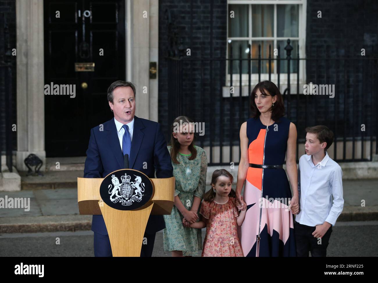 (160713) -- LONDON, JULY 13, 2016 -- British outgoing Prime Minister David Cameron(1st L) gives a speech with his family before leaving 10 Downing Street in London, Britain on July 13, 2016. Cameron bid farewell to 10 Downing Street and headed to Buckingham Palace to offer his resignation to Queen Elizabeth II on Wednesday afternoon. ) BRITAIN-LONDON-DAVID CAMERON-RESIGNATION HanxYan PUBLICATIONxNOTxINxCHN   160713 London July 13 2016 British Outgoing Prime Ministers David Cameron 1st l Gives a Speech With His Family Before leaving 10 Downing Street in London Britain ON July 13 2016 Cameron BI Stock Photo