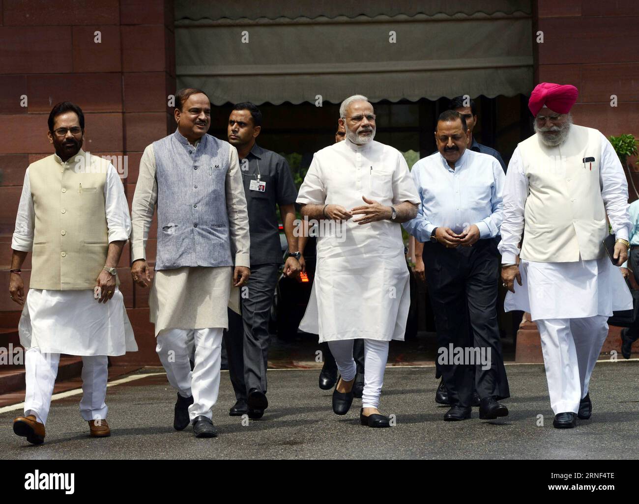 (160718) -- NEW DELHI, July 18, 2016 -- Indian Prime Minister Narendra Modi (C, front) arrives at Parliament House with his cabinet colleagues on the first day of monsoon session in New Delhi, India, July 18, 2016. The monsoon session of Indian lower house began on Monday but was adjourned shortly to Tuesday due to the death of Madhya Pradesh MP Dalpat Singh Paraste. ) (sxk) INDIA-NEW DELHI-MONSOON SESSION-PM-MODI Stringer PUBLICATIONxNOTxINxCHN   160718 New Delhi July 18 2016 Indian Prime Ministers Narendra Modes C Front arrives AT Parliament House With His Cabinet colleagues ON The First Day Stock Photo