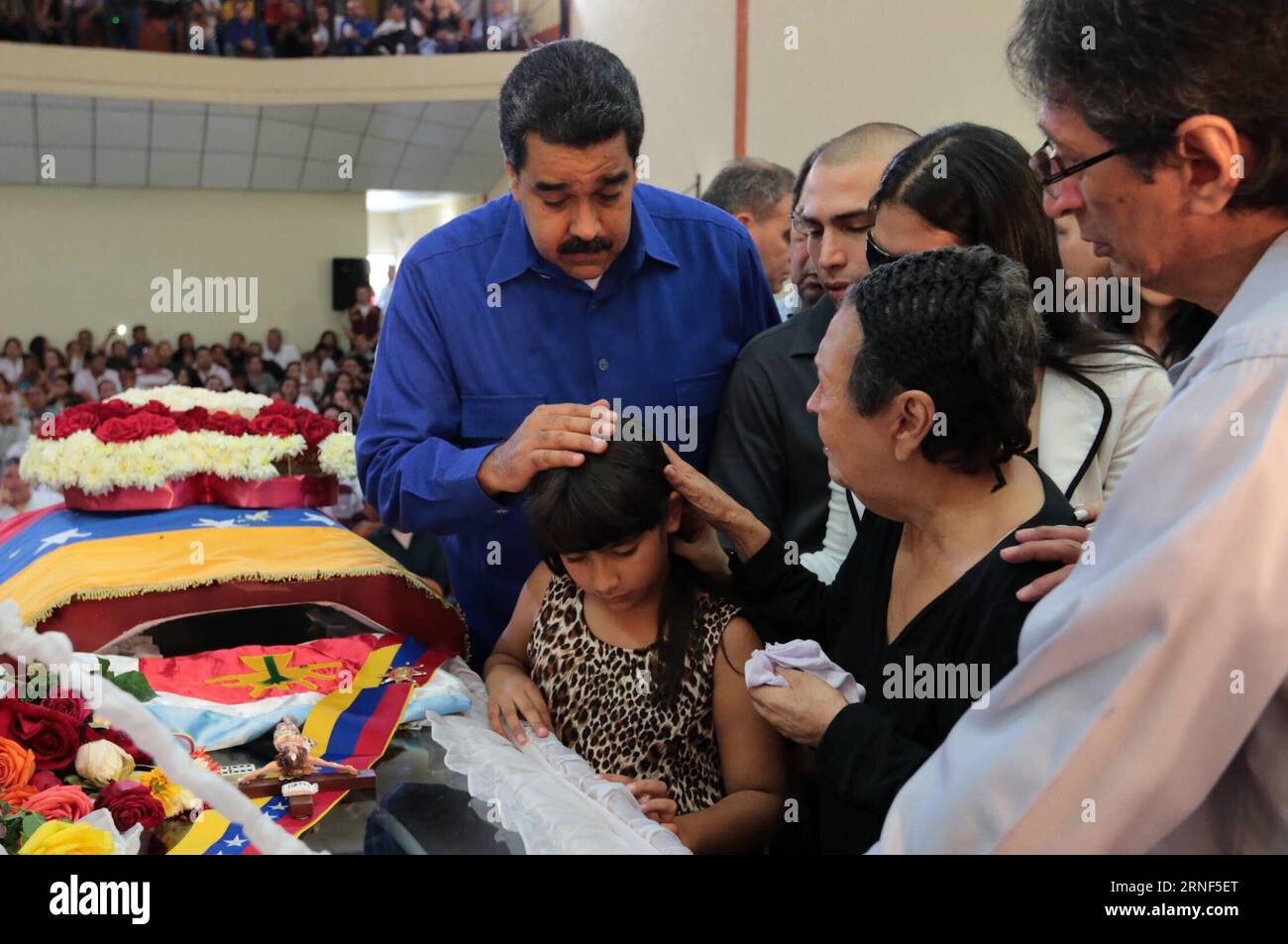 BARINAS, July 19, 2016 -- Image provided by the Venezuelan Presidency shows President Nicolas Maduro (R) interacting with a girl during the funeral of Anibal Chavez, brother of late Venezuelan President Hugo Chavez, at Casa del Alba, in Barinas, Venezuela, on July 19, 2016. ) (jp) (da) NO ARCHIVE-NO SALES EDITORIAL USE ONLY VENEZUELA-BARINAS-POLITICS-FUNERAL VENEZUELA SxPRESIDENCY PUBLICATIONxNOTxINxCHN   Barinas July 19 2016 Image provided by The Venezuelan Presidency Shows President Nicolas Maduro r interacting With a Girl during The Funeral of Anibal Chavez Brother of Late Venezuelan Presid Stock Photo