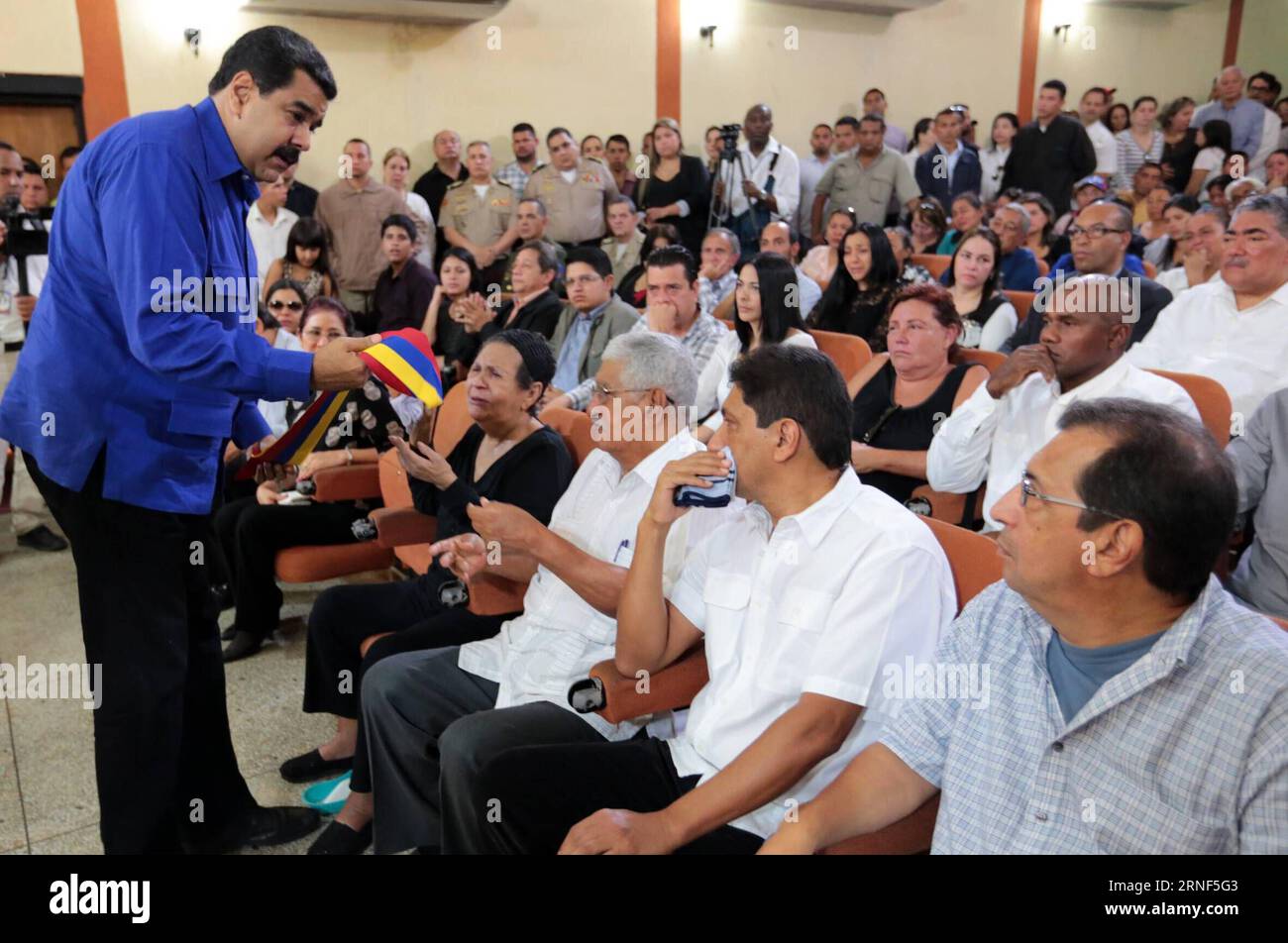 BARINAS, July 19, 2016 -- Image provided by the Venezuelan Presidency shows President Nicolas Maduro (R) interacting with relatives during the funeral of Anibal Chavez, brother of late Venezuelan President Hugo Chavez, at Casa del Alba, in Barinas, Venezuela, on July 19, 2016. ) (jp) (da) NO ARCHIVE-NO SALES EDITORIAL USE ONLY VENEZUELA-BARINAS-POLITICS-FUNERAL VENEZUELA SxPRESIDENCY PUBLICATIONxNOTxINxCHN   Barinas July 19 2016 Image provided by The Venezuelan Presidency Shows President Nicolas Maduro r interacting With Relatives during The Funeral of Anibal Chavez Brother of Late Venezuelan Stock Photo