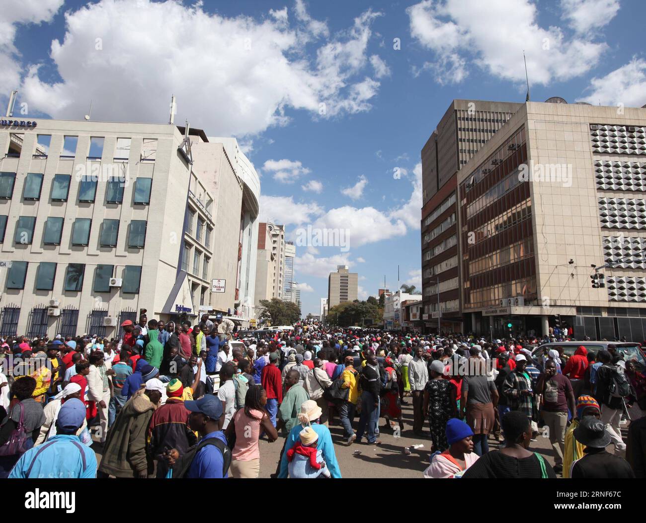 President Robert Mugabe s supporters march in the city center of Harare, capital of Zimbabwe, July 20, 2016. Thousands of President Robert Mugabe s supporters marched across the center of Zimbabwean capital Harare Wednesday. () (zy) ZIMBABWE-HARARE-MARCH Xinhua PUBLICATIONxNOTxINxCHN   President Robert Mugabe S Supporters March in The City Center of Harare Capital of Zimbabwe July 20 2016 thousands of President Robert Mugabe S Supporters marched across The Center of Zimbabwean Capital Harare Wednesday ZY Zimbabwe Harare March XINHUA PUBLICATIONxNOTxINxCHN Stock Photo