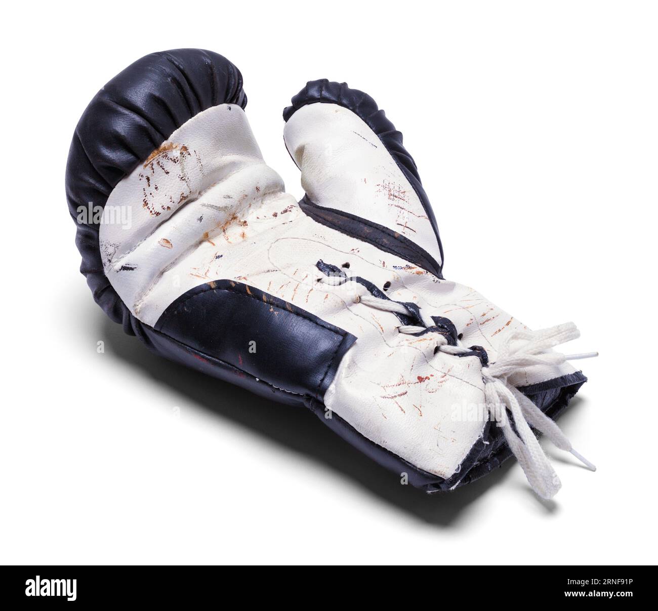 Old Boxing Glove Cut Out on White. Stock Photo