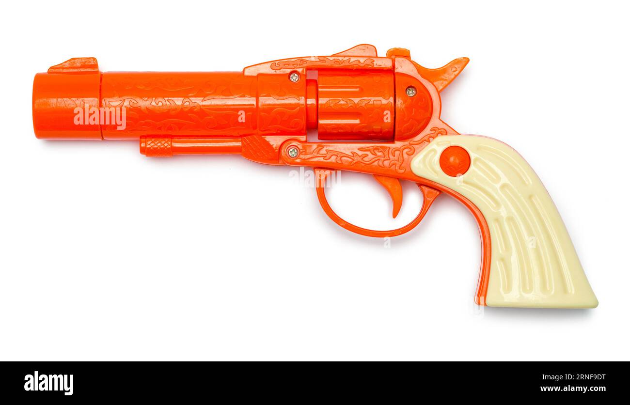 Orange Toy Pistol Cut Out on White. Stock Photo