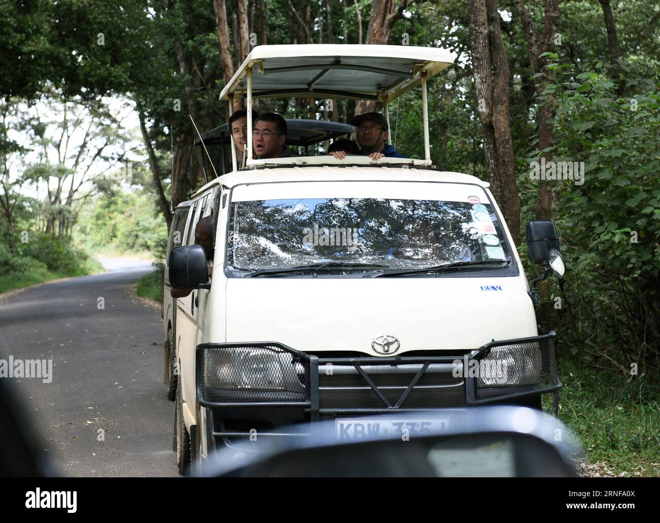 NAIROBI, July 26, 2016 -- Chinese tourists visit by van at the Nairobi National Park in Nairobi, capital of Kenya, July 26, 2016. Kenya has recorded minimal wildlife attacks on humans inside parks and game reserves thanks to solid measures that include enhanced vigilance and public outreach, an official said on Tuesday. ) (wjd) KENYA-NAIROBI-WILDLIFE ATTACK-PREVENTION LixBaishun PUBLICATIONxNOTxINxCHN   Nairobi July 26 2016 Chinese tourists Visit by van AT The Nairobi National Park in Nairobi Capital of Kenya July 26 2016 Kenya has Recorded Low Wildlife Attacks ON Humans Inside Parks and Game Stock Photo