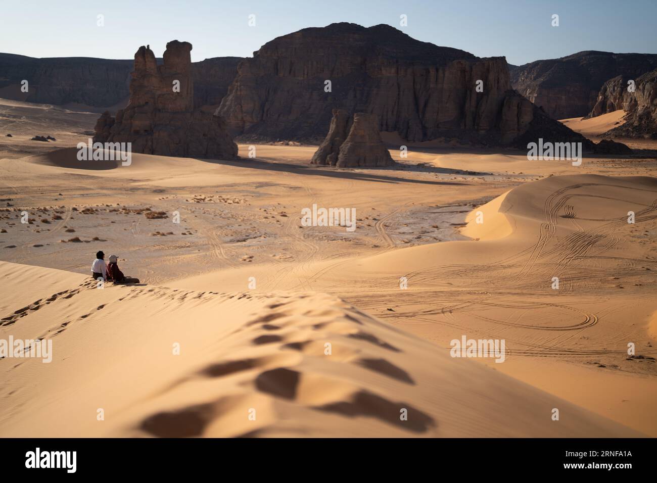 view in the Sahara desert of Tadrart rouge tassili najer in Djanet City  ,Algeria.colorful orange sand, rocky mountains Stock Photo