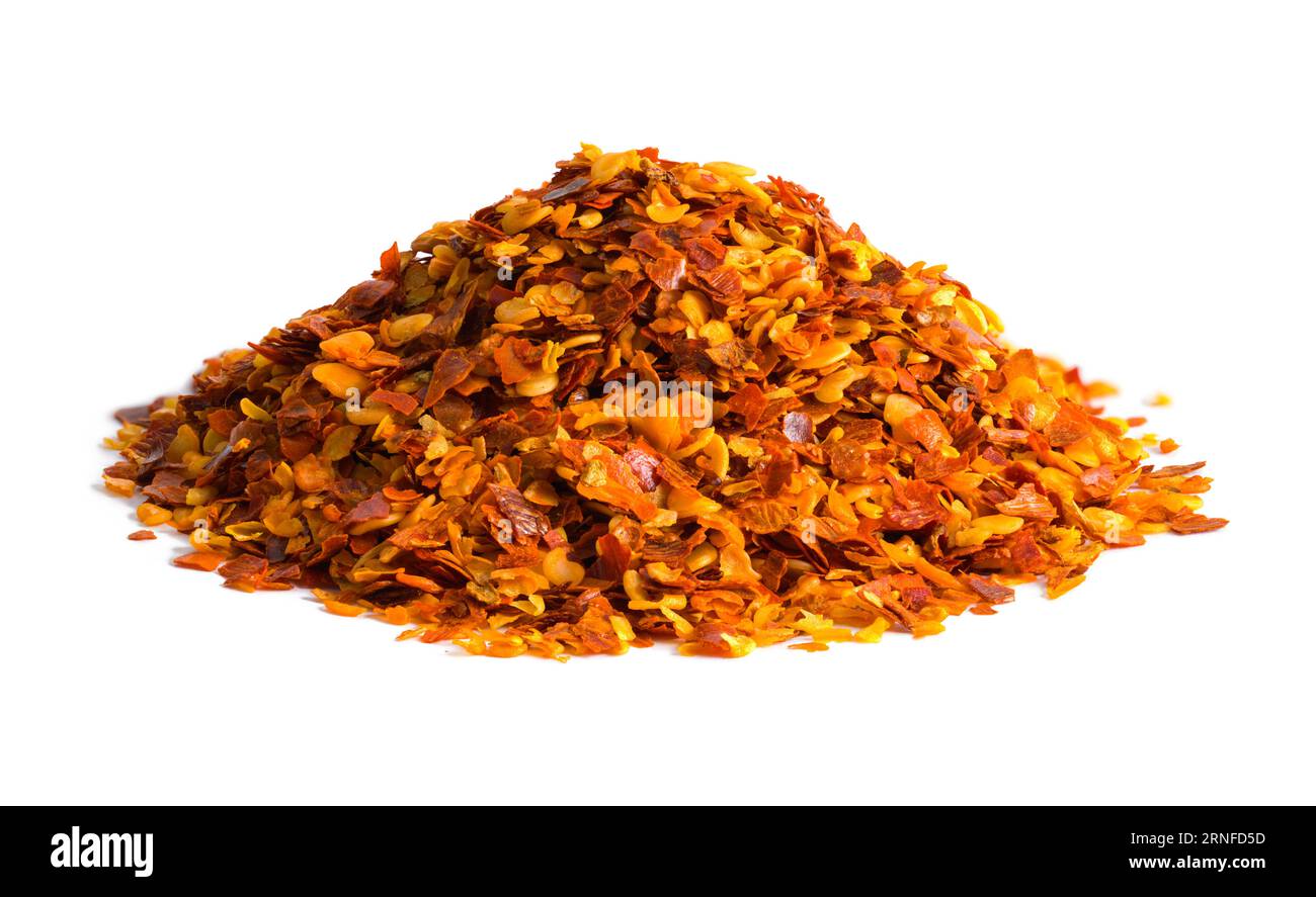 Red Bell Pepper Seeds Pile Cut Out on White. Stock Photo