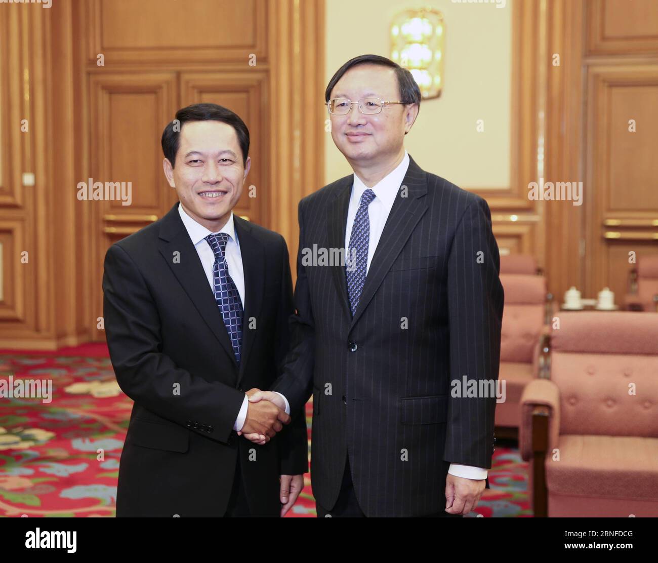 (160802) -- BEIJING, Aug. 2, 2016 -- Chinese State Councilor Yang Jiechi (R) meets with Lao Foreign Minister Saleumxay Kommasith in Beijing, capital of China, Aug. 2, 2016. ) (mp) CHINA-BEIJING-YANG JIECHI-LAO FM-MEETING (CN) DingxLin PUBLICATIONxNOTxINxCHN   160802 Beijing Aug 2 2016 Chinese State Councilors Yang Jiechi r Meets With LAO Foreign Ministers Saleumxay Kommasith in Beijing Capital of China Aug 2 2016 MP China Beijing Yang Jiechi LAO FM Meeting CN DingxLin PUBLICATIONxNOTxINxCHN Stock Photo