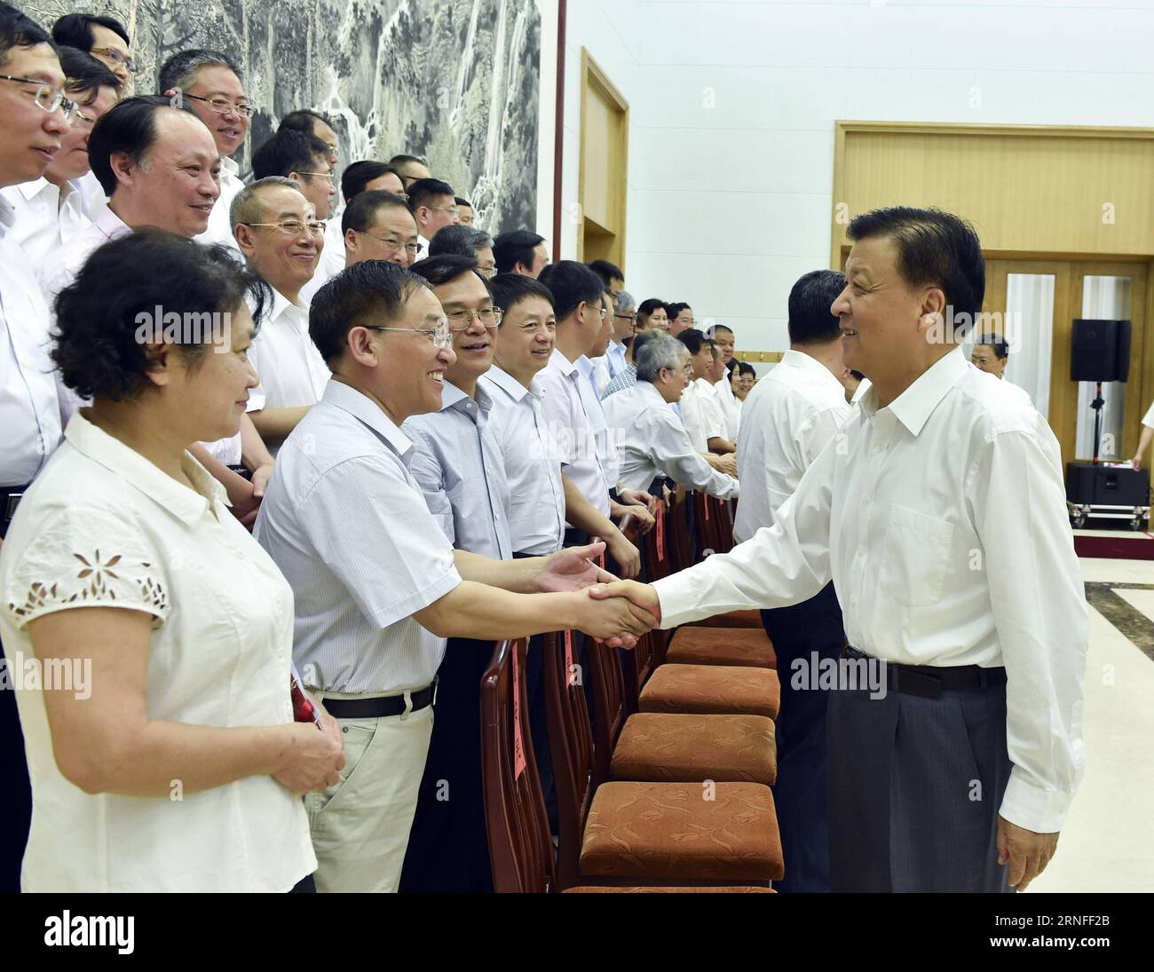 (160805) -- BEIDAIHE, Aug. 5, 2016 -- Liu Yunshan (R front), a member of the Standing Committee of the Political Bureau of the Communist Party of China (CPC) Central Committee and the Secretariat of the CPC Central Committee, meets with 56 scientists and experts enjoying a state-sponsored summer vacation at Beidaihe, a popular seaside resort near China s capital Beijing, Aug. 5, 2016. )(wjq) CHINA-BEIDAIHE-LIU YUNSHAN-EXPERTS & SCIENTISTS-MEETING (CN) GaoxJie PUBLICATIONxNOTxINxCHN   160805 Beidaihe Aug 5 2016 Liu Yunshan r Front a member of The thing Committee of The Political Bureau of The C Stock Photo