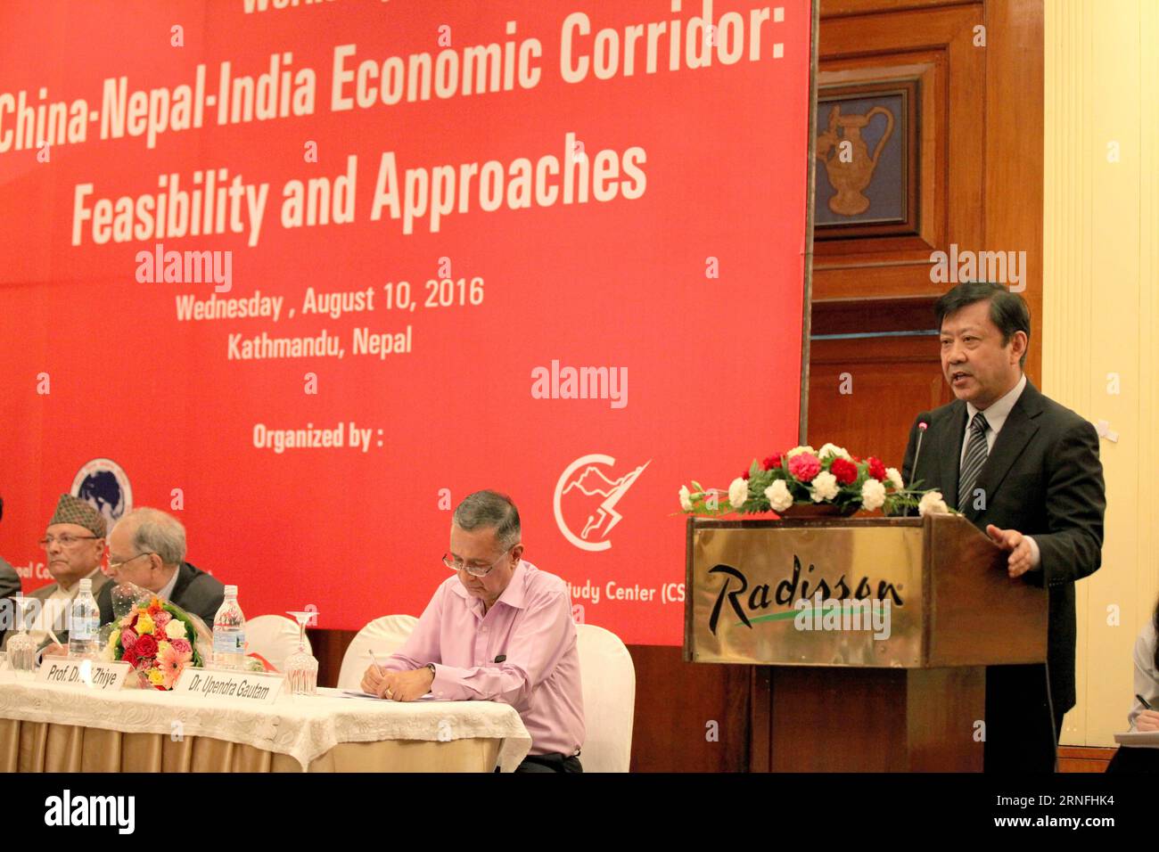 (160810) -- KATHMANDU, Aug. 10, 2016 -- Ji Zhiye, president of China Institutes of Contemporary International Relations (R), addresses the China-Nepal-India Economic Corridor: Feasibility and Approaches workshop in Kathmandu, Nepal, Aug. 10, 2016. The establishment of a China-Nepal-India economic corridor will help secure economic prosperity of the entire Asian region through enhancing cooperation on trade, tourism, energy and connectivity, experts said here on Wednesday. ) (zjy) NEPAL-KATHMANDU-CHINA-NEPAL-INDIA-ECONOMIC CORRIDOR-WORKSHOP ZhouxShengping PUBLICATIONxNOTxINxCHN   160810 Kathman Stock Photo