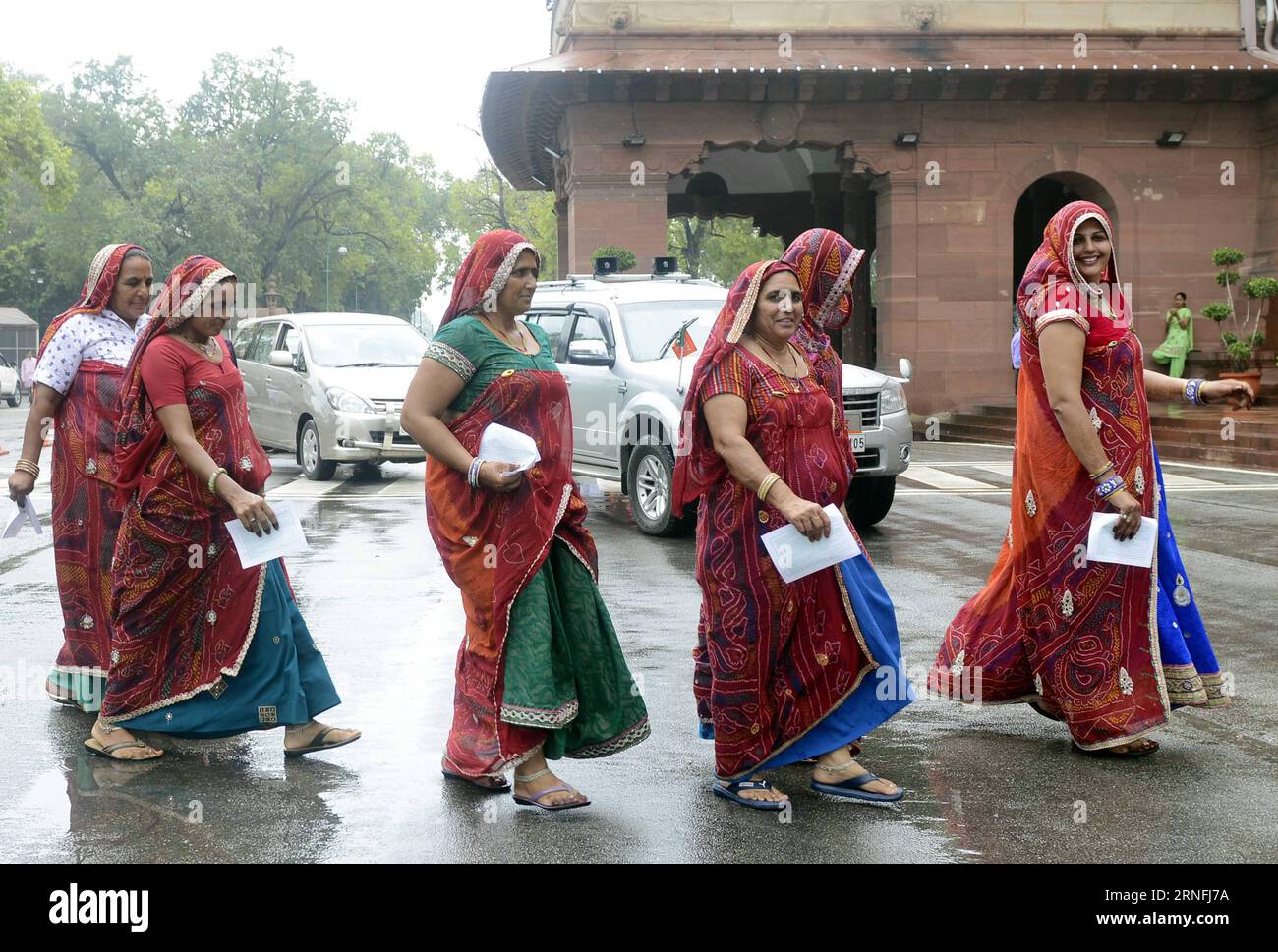 (160811) -- NEW DELHI, Aug. 11, 2016 -- Women dressed with traditional attire from Jhunjhunu district of Rajasthan wait in line to spectate the monsoon session in Indian parliament house in New Delhi, India, on Aug. 11, 2016. ) (wtc) INDIA-NEW DELHI-PARLIAMENT-WOMEN SPECTATOR Stringer PUBLICATIONxNOTxINxCHN   160811 New Delhi Aug 11 2016 Women Dressed With Traditional attire from JHUNJHUNU District of Rajasthan Wait in Line to  The Monsoon Session in Indian Parliament House in New Delhi India ON Aug 11 2016 WTC India New Delhi Parliament Women Spectator Stringer PUBLICATIONxNOTxINxCHN Stock Photo