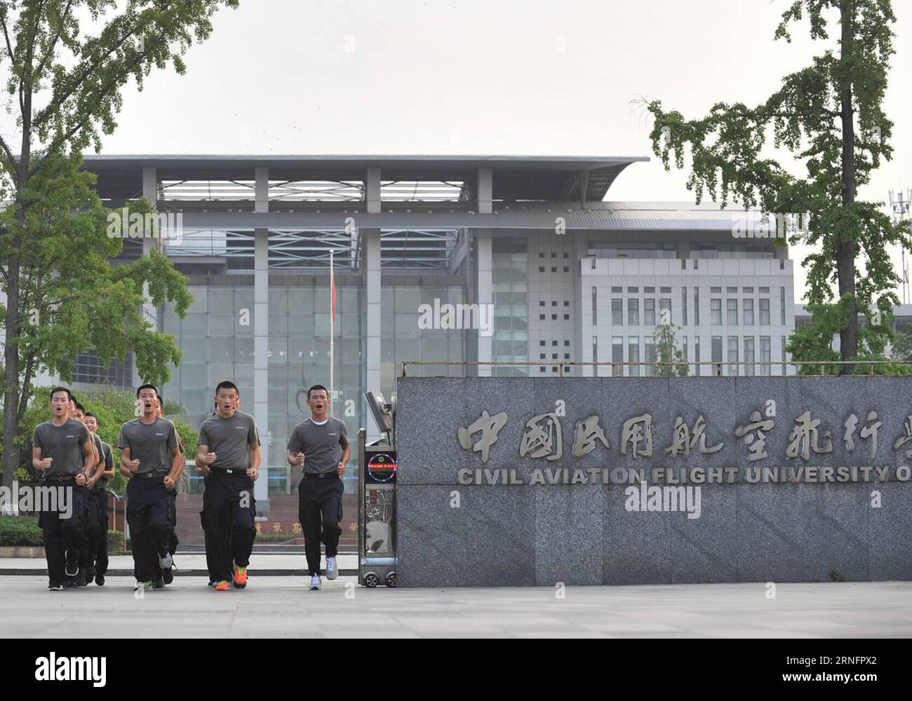 (160821) -- DEYANG, Aug. 19  2016 -- Trainees practise at the Guanghan Campus of China Aviation Flight University of China in Deyang, southwest China s Sichuan Province, Aug. 18, 2016. Aviation security officer, also known as flight security officer, is responsible for guarding safety of persons on board and plane on a civil aircraft. To become an aviation security officer is not an easy thing. After a preliminary training for two months and a half, applicants must have at least 100-hour training on real planes. Despite of rigid test, many Chinese young people choose this job as their career. Stock Photo