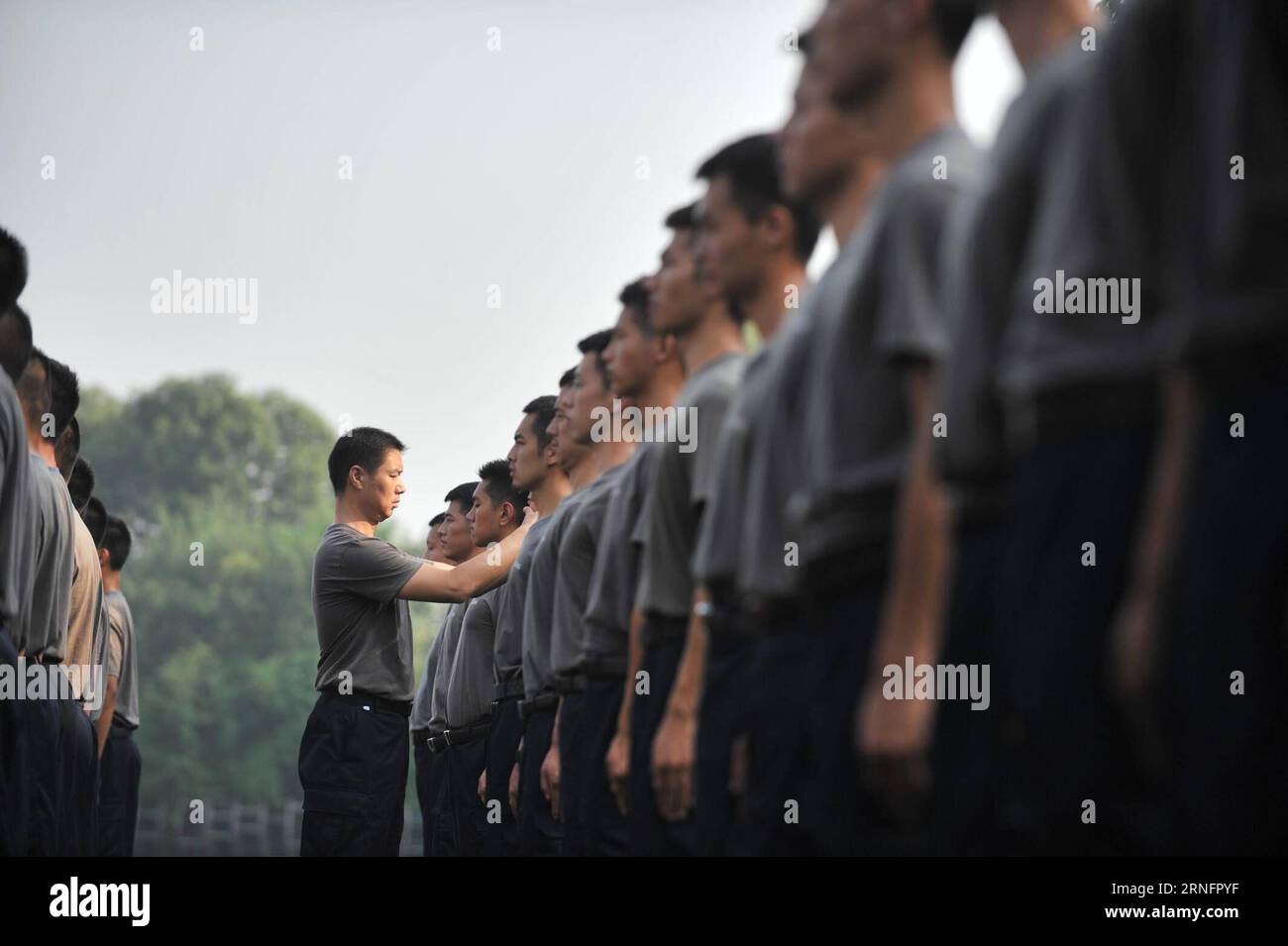 (160821) -- DEYANG, Aug. 19  2016 -- Trainees practise at the Guanghan Campus of China Aviation Flight University of China in Deyang, southwest China s Sichuan Province, Aug. 19, 2016. Aviation security officer, also known as flight security officer, is responsible for guarding safety of persons on board and plane on a civil aircraft. To become an aviation security officer is not an easy thing. After a preliminary training for two months and a half, applicants must have at least 100-hour training on real planes. Despite of rigid test, many Chinese young people choose this job as their career. Stock Photo