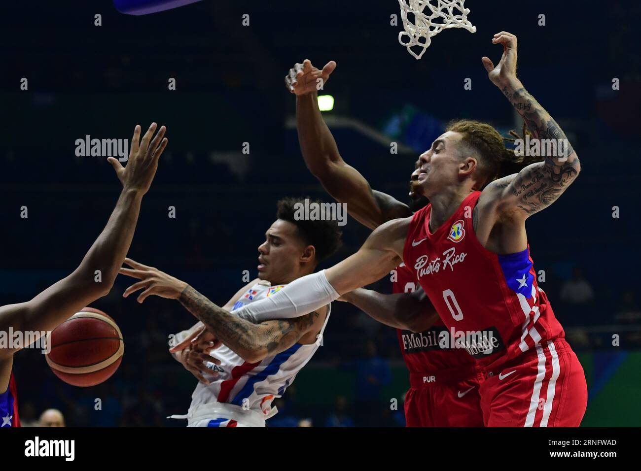 Quezon, Philippines. 01st Sep, 2023. Lester Quinones (L) of Dominican Republic basketball team, Ismael Romero (M) and Isaiah Pineiro (R) of Puerto Rico men basketball team in action during the FIBA Men's Basketball World Cup 2023 match between Dominican Republic and Puerto Rico at the Araneta Coliseum. Final score Puerto Rico 102:97 Dominican Republic. Credit: SOPA Images Limited/Alamy Live News Stock Photo