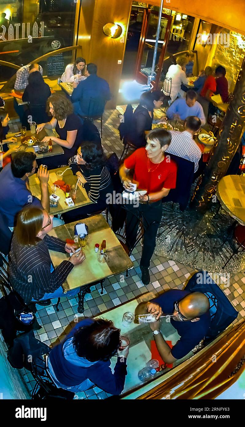 PARIS, France,  High Angle, Large Crowd People sitting at table in Dining Room ,Waitress Working Tables, inside Mexican Restaurant, 'Fajitas', in Latin Quarter, 6th dist. Stock Photo