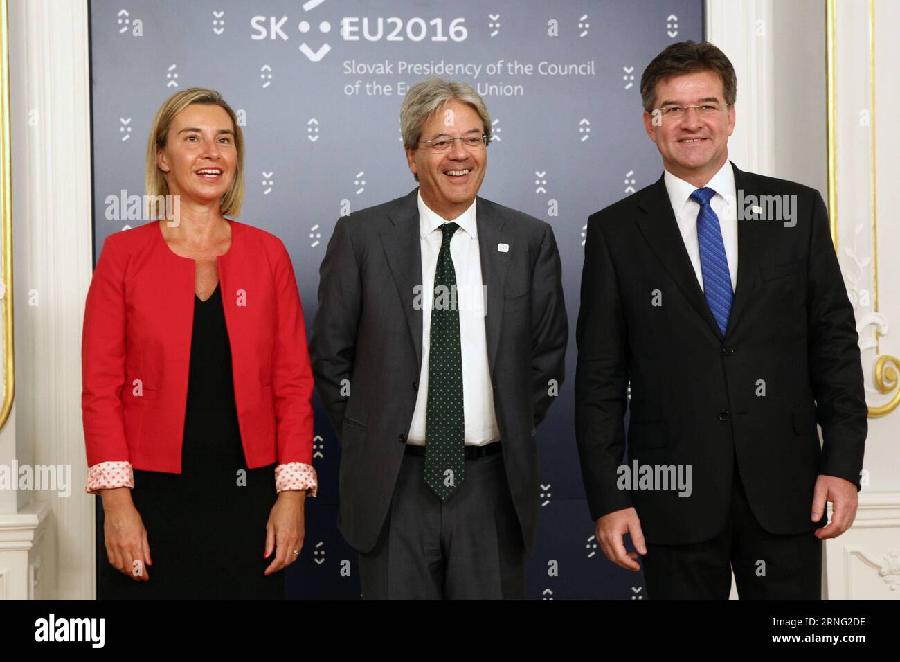 (160902) -- BRATISLAVA, Sept.2, 2016 -- Slovak Minister of foreign and European Affairs Mirislav Lajcak (R) and European Union (EU) High Representative for Foreign Affairs and Security Policy Federica Mogherini (L) welcome Italian Foreign Minister Paolo Gentiloni before the informal meeting of foreign affairs ministers, also known as Gymnich, in Bratislava, capital of Slovakia, Sept. 2, 2016. The current issues of global foreign and security policy will be high on the agenda of Gymnich, which kicked off on Friday. ) SLOVAKIA-BRATISLAVA-EU FM MEETING AndrejxKlizan PUBLICATIONxNOTxINxCHN   16090 Stock Photo