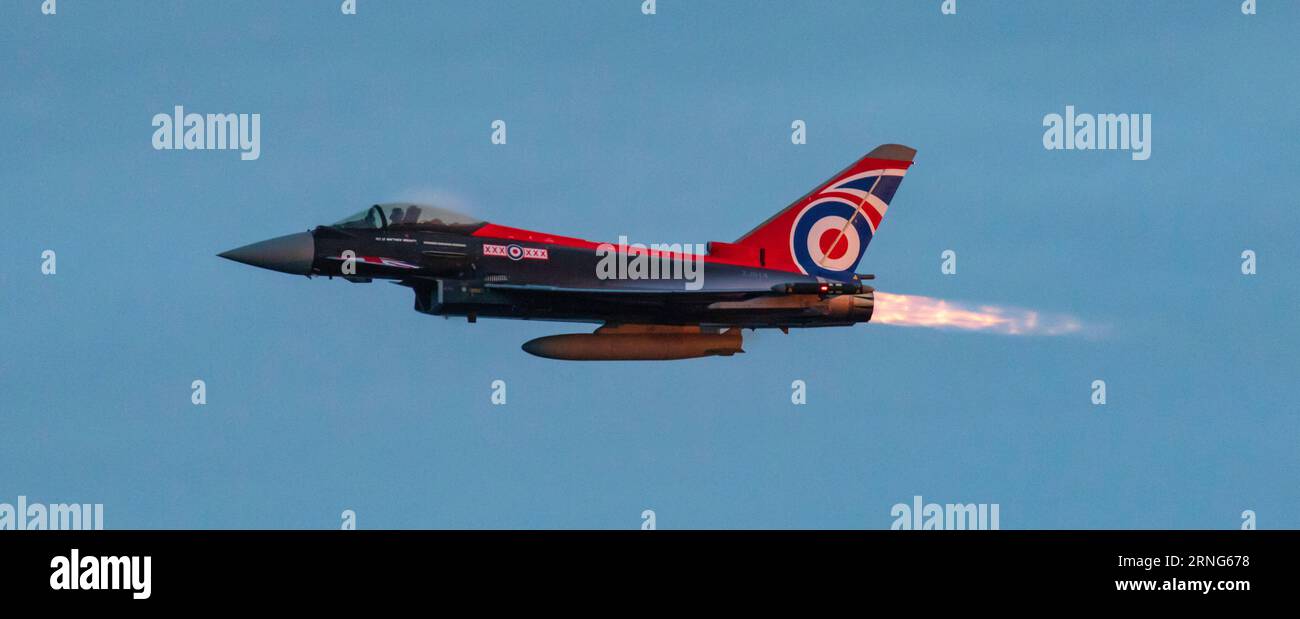 Bournemouth Air Festival, Bournemouth, Dorset, UK. 1st Sep 2023. An RAF Eurofighter Typhoon FGR.4 piloted by Flight Lieutenant Matt Brighty from 29 Squadron based at RAF Coningsby in Lincolnshire puts on an amazing dusk air display with his Union Jack emblazoned aircraft at the Bournemouth Air Festival. Credit: Stuart Robertson/Alamy Live News. Stock Photo