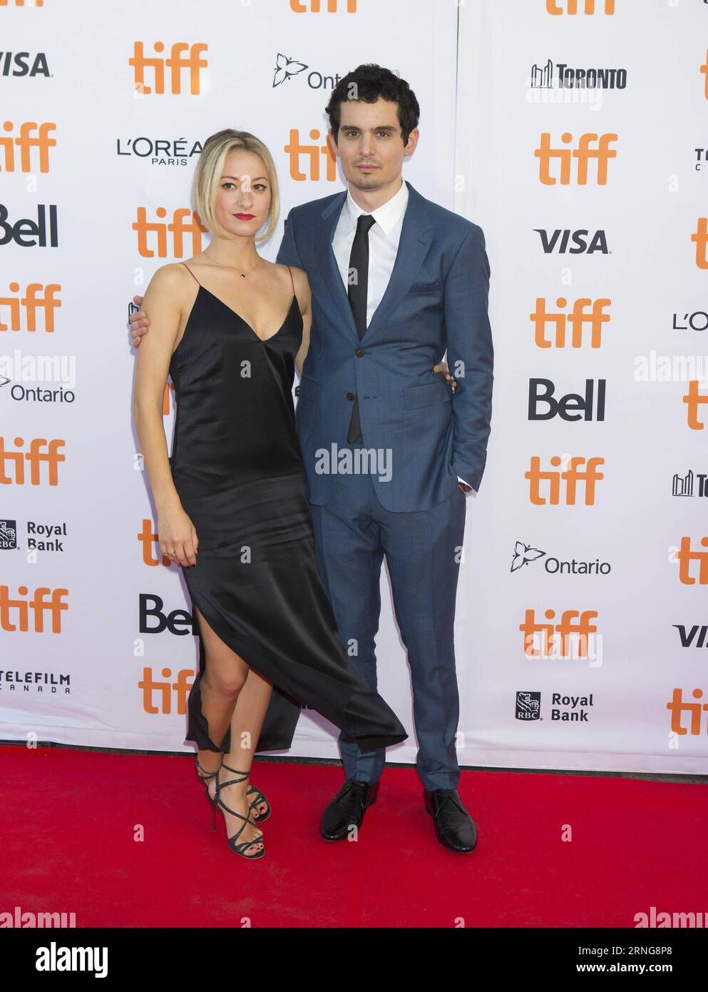 TORONTO, Sept. 12, 2016 -- Director Damien Chazelle (R) and actress Olivia Hamilton pose for photos before the Canadian premiere of the film La La Land at the Princess of Wales Theater during the 41st Toronto International Film Festival in Toronto, Canada, Sept. 12, 2016. ) (zjy) CANADA-TORONTO-FILM FESTIVAL- LA LA LAND ZouxZheng PUBLICATIONxNOTxINxCHN   Toronto Sept 12 2016 Director Damien Chazelle r and actress Olivia Hamilton Pose for Photos Before The Canadian Premiere of The Film La La Country AT The Princess of Wales Theatre during The 41st Toronto International Film Festival in Toronto Stock Photo
