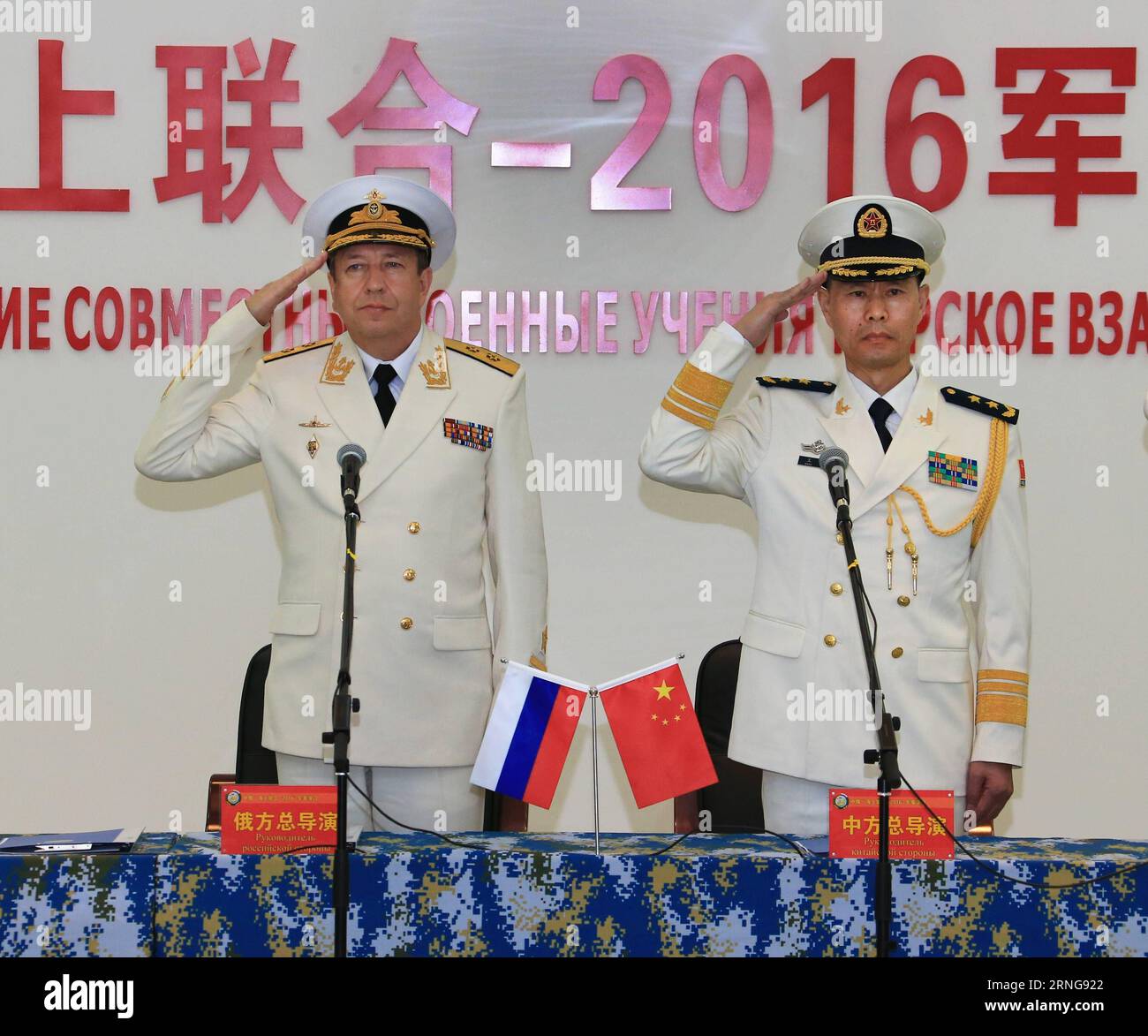 (160913) -- ZHANJIANG, Sept. 13, 2016 -- Wang Hai (R), Chinese chief director of the exercise and deputy commander of the Chinese Navy, and his Russian counterpart Alexander Fedotenkov declare the start of a joint naval drill in Zhanjiang, south China s Guangdong Province, Sept. 13, 2016. China and Russia started Joint Sea 2016 drill off Guangdong Province in the South China Sea on Tuesday. ) (zhs) CHINA-RUSSIA-JOINT NAVAL DRILL-START (CN) ZhaxChunming PUBLICATIONxNOTxINxCHN   160913 Zhanjiang Sept 13 2016 Wang Hai r Chinese Chief Director of The EXERCISE and Deputy Commander of The Chinese Na Stock Photo