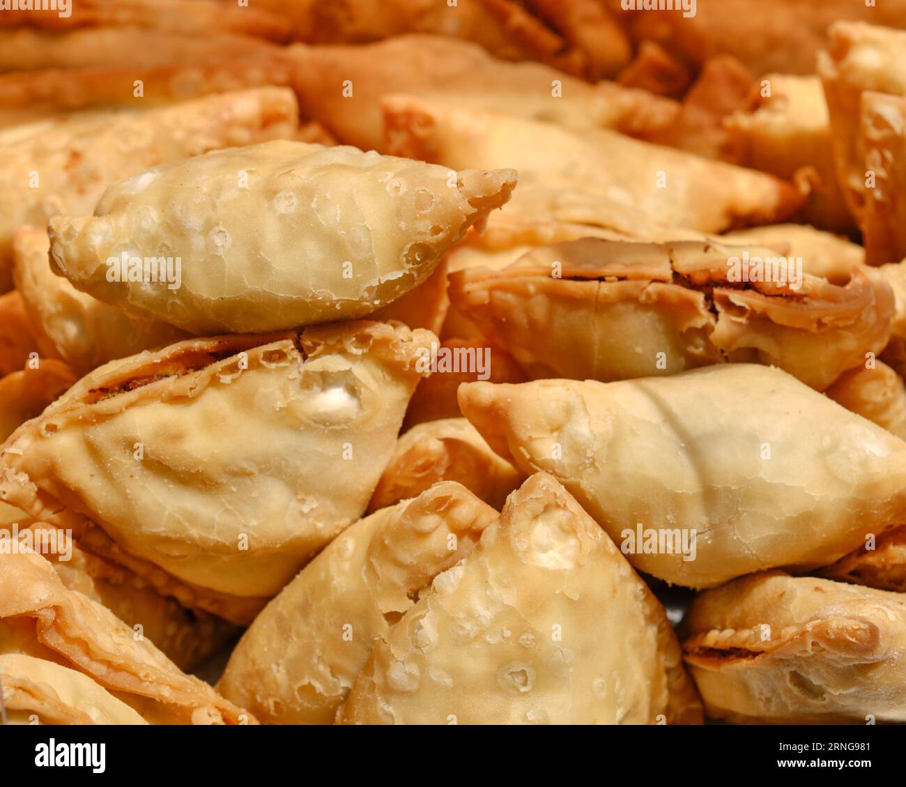 close up of a pile of samosas Stock Photo