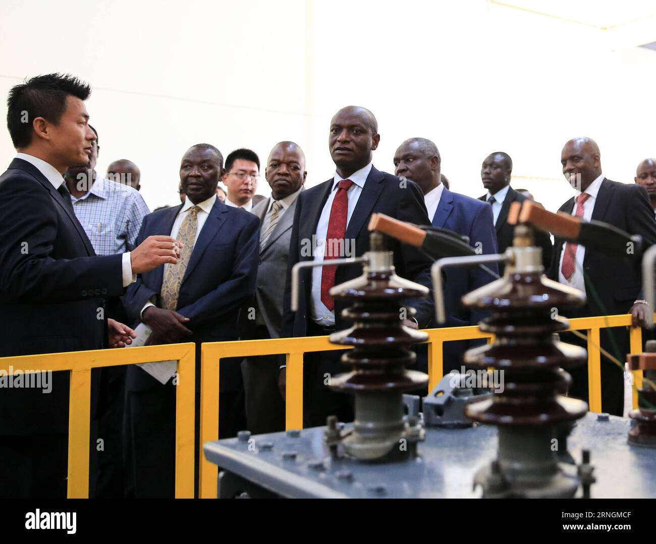 (161006) -- NAIROBI, Oct. 6, 2016 -- Charles Keter (C), Kenya s Cabinet Secretary for Energy and Petroleum, visits Yocean manufacturing transformers factory on the outskirts of Nairobi, Kenya, on Oct. 5, 2016. Kenya s first transfomer-manufacturing plant, set up by Chinese company Yocean Group, opened on Wednesday. Kenya has been relying on transformers from abroad, mostly from India. Kenya s Cabinet Secretary for Energy and Petroleum, Charles Keter, said the plant will ease procurement of transformers and other electrical appliances.) (dtf) KENYA-NAIROBI-ENERGY-CHINA-TRANSFORMER PanxSiwei PUB Stock Photo