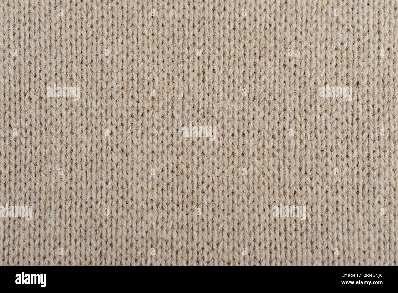 Beige handmade Knitted Fabric Texture from angora yarn Stock Photo