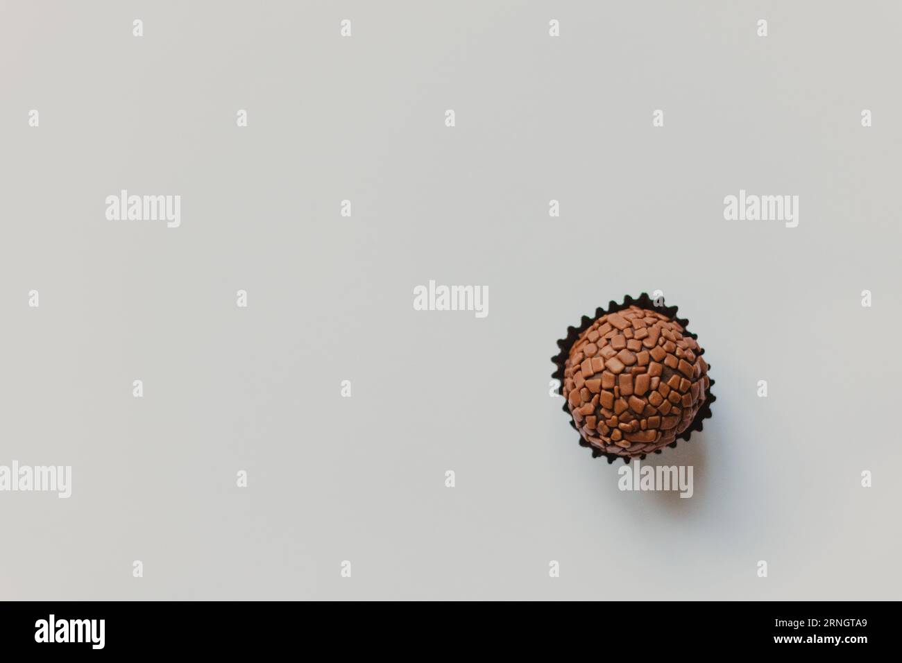 single granluated brigadeiro at the table Stock Photo