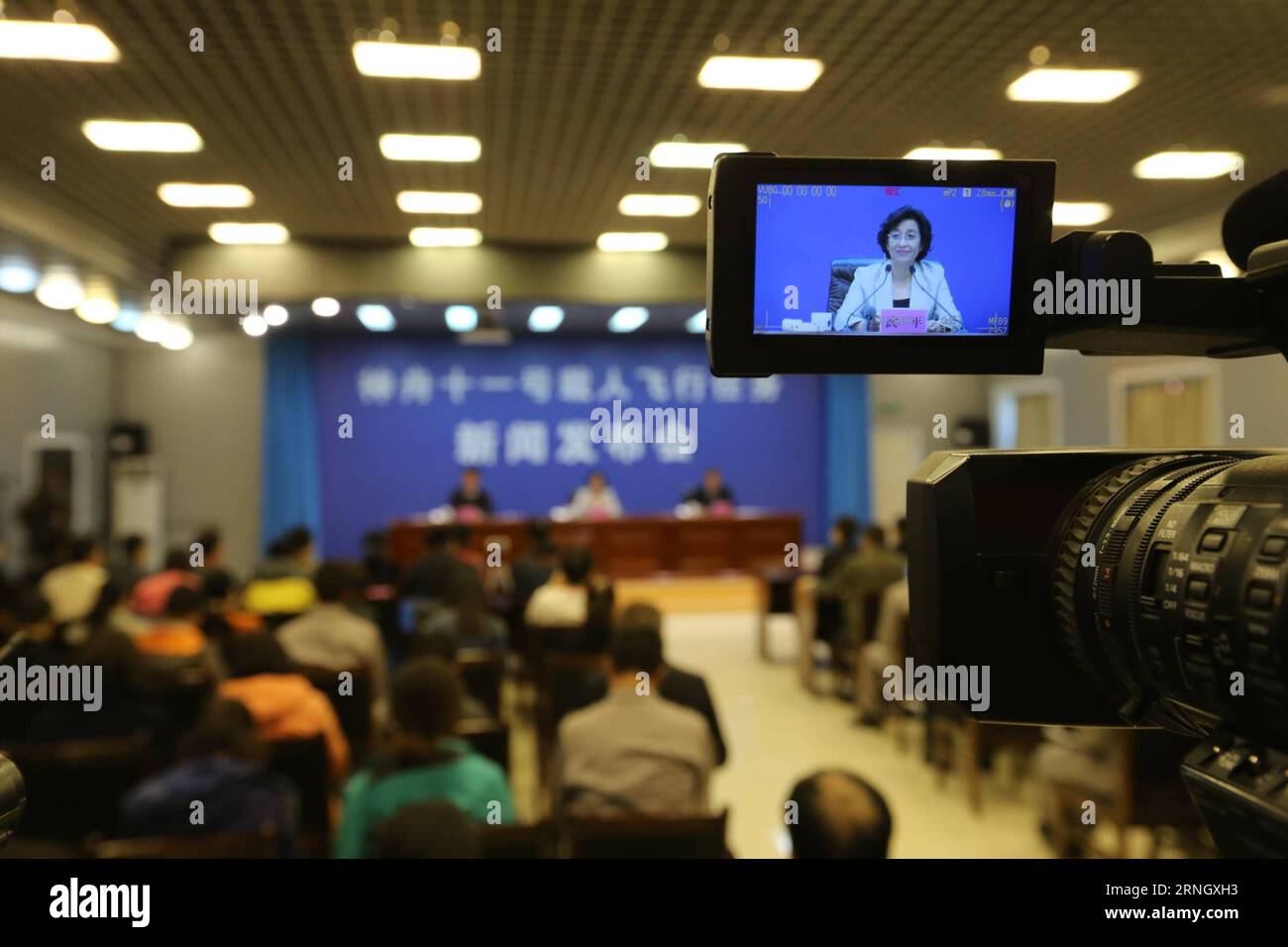 (161016) -- JIUQUAN, Oct. 16, 2016 -- Wu Ping, deputy director of China s manned space engineering office, addresses a press conference at the Jiuquan Satellite Launch Center in northwest China, Oct. 16, 2016. The Shenzhou-11 manned spacecraft will be launched at 7:30 a.m. Oct. 17, 2016 Beijing Time (2330 GMT Oct. 16). The spaceship will take two male astronauts Jing Haipeng and Chen Dong into space. The spacecraft will dock with orbiting space lab Tiangong-2 within two days and the astronauts will stay in the space lab for 30 days before returning to Earth. The 50-year-old Jing will be comman Stock Photo