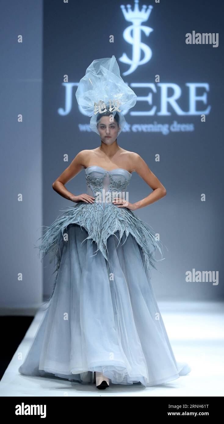 wei wei fashion collection dress Wei did say that he's been thinking about mature women, the ladies he sees in Milan, Paris, and Shanghai who dress well and confidently, and whose definition of elegance is lived-in rather