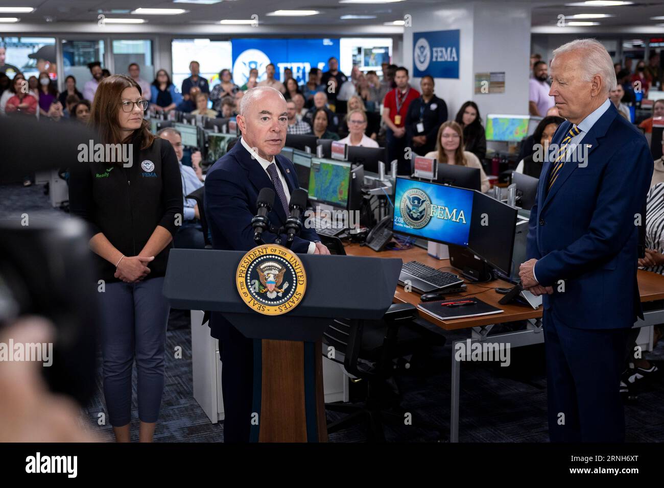 Washington, United States. 31st Aug, 2023. U.S. President Joe Biden, right, listens to Homeland Security Secretary Alejandro Mayorkas, center, as FEMA Associate Administrator for Response and Recovery Anne Blink, left, looks on during a visit to the Federal Emergency Management Agency Headquarters to thank staff for their response to the wildfires in Maui and Hurricane Idalia, August 31, 2023 in Washington, DC Credit: Tia Dufour/Homeland Security/Alamy Live News Stock Photo