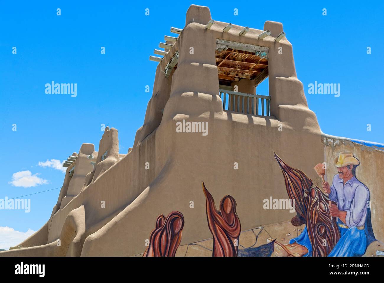 Towers of traditional adobe structure designed shopping plaza in