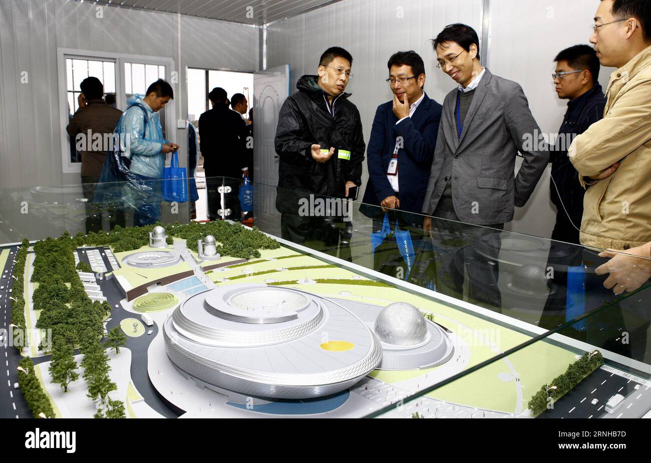 (161108) -- SHANGHAI, Nov. 8, 2014 -- Guests visit the model of the Shanghai Planetarium during its foundation laying ceremony in Shanghai, east China, Nov. 8, 2016. Covering an area of 38,164 square meters, the planetarium will include a main building and ancillary constructions, such as an observation base for young people, a solar tower and observatory. Fang Zhe) (wsw) CHINA-SHANGHAI-PLANETARIUM-CONSTRUCTION (CN) Fangzhe PUBLICATIONxNOTxINxCHN   Shanghai Nov 8 2014 Guests Visit The Model of The Shanghai Planetarium during its Foundation Laying Ceremony in Shanghai East China Nov 8 2016 cove Stock Photo