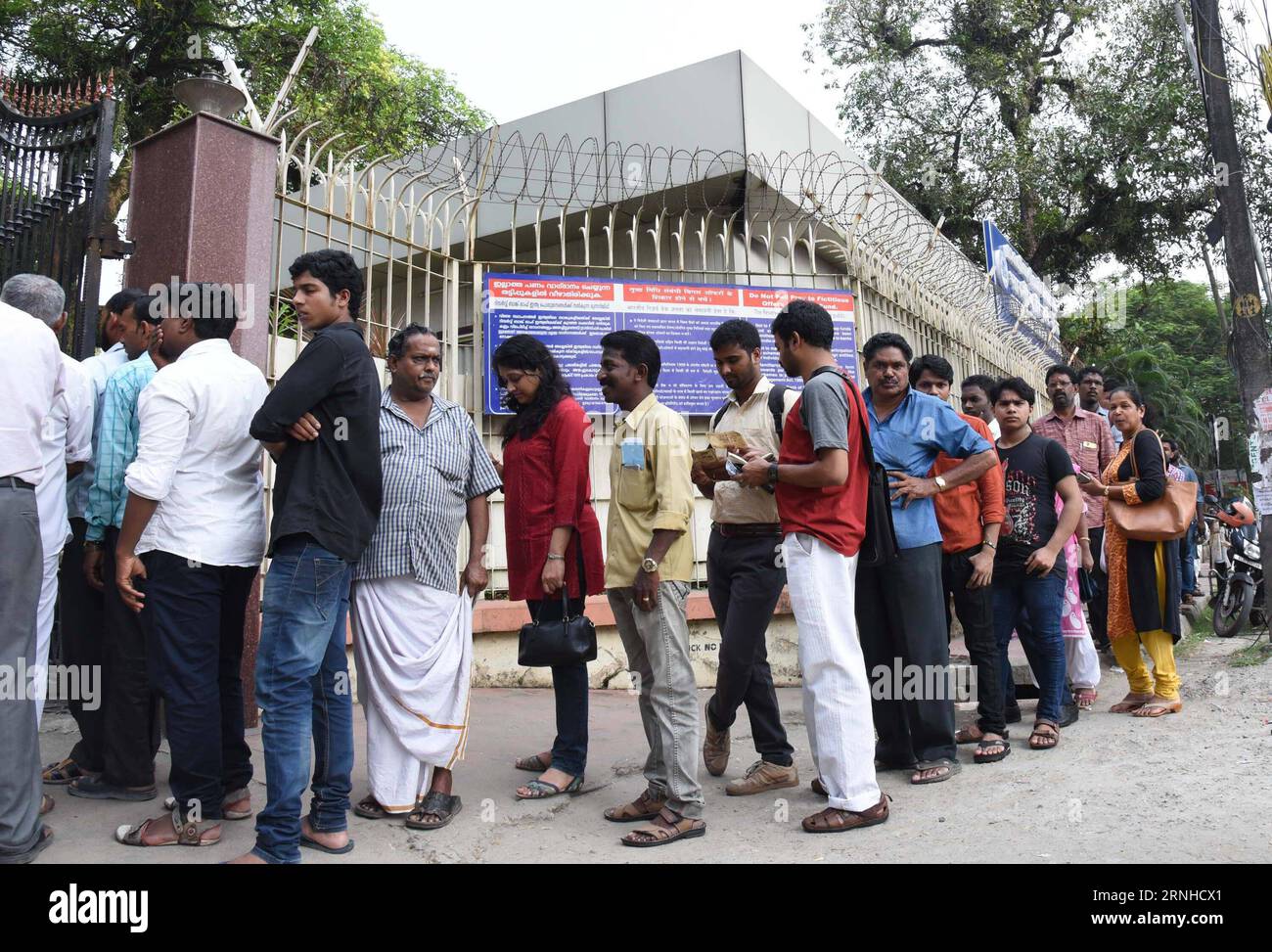 Cash for queues: people paid to stand in line amid India's bank