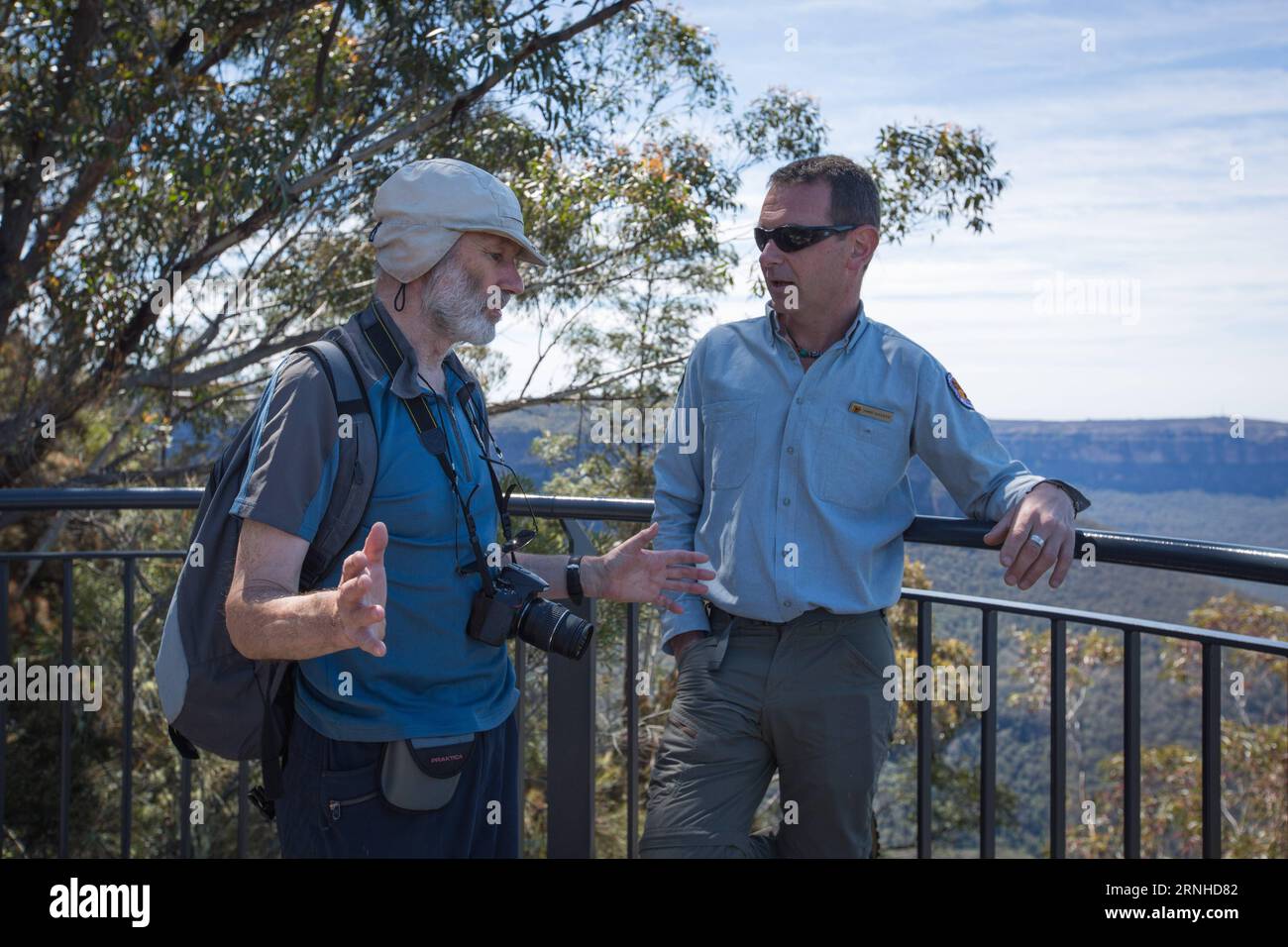 (161111) -- SYDNEY, Nov. 11, 2016 -- Park ranger Jamie Salijevic (R) introduces the park to a tourist in the Blue Mountains National Park in New South Wales state, Australia, Oct. 25, 2016. Four percent of Australia s continent is protected for conservation, encompassed within just over 500 national parks, or some 28 million hectares of land. Most national parks are managed by Australia s state and territory governments -- states are responsible for land management under Australia s constitution -- though the Commonwealth Government looks after six national parks, the National Botanic Gardens Stock Photo