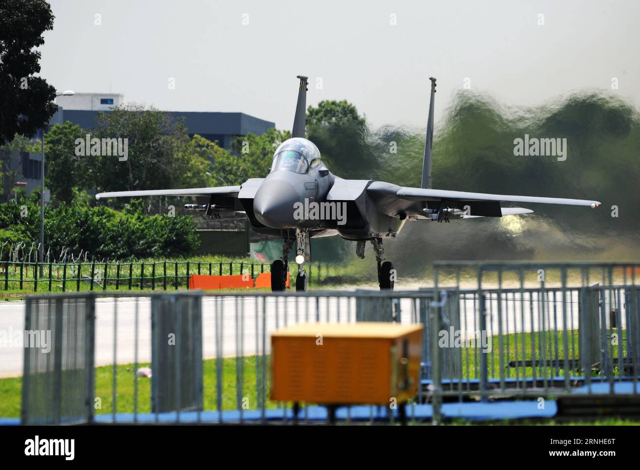 An F-15SG fighter plane of the Republic of Singapore Air Force (RSAF) prepares to take off during a rehearsal of exercise Torrent on Singapore s Lim Chu Kang road, Nov. 12, 2016. The Republic of Singapore Air Force (RSAF) Sunday conducted exercise Torrent, in which a public road was converted into a runway for aircraft take-off and landing. The alternate runway exercise, which was last conducted in 2008 and now is in its seventh edition, aims to increase RSAF s aircraft take-off and landing capability. ) (sxk) SINGAPORE-RSAF-EXERCISE TORRENT-REHEARSAL ThenxChihxWey PUBLICATIONxNOTxINxCHN   to Stock Photo