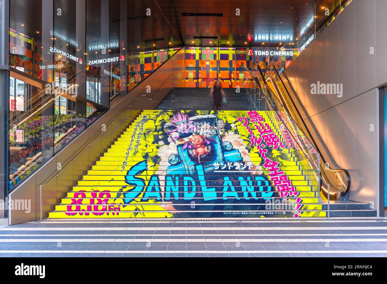 tokyo, ikebukuro - aug 22 2023: A stairs advertising at Toho Cinemas of the Japanese animated movie Sand Land with its hero Beelzebub illustrated by m Stock Photo