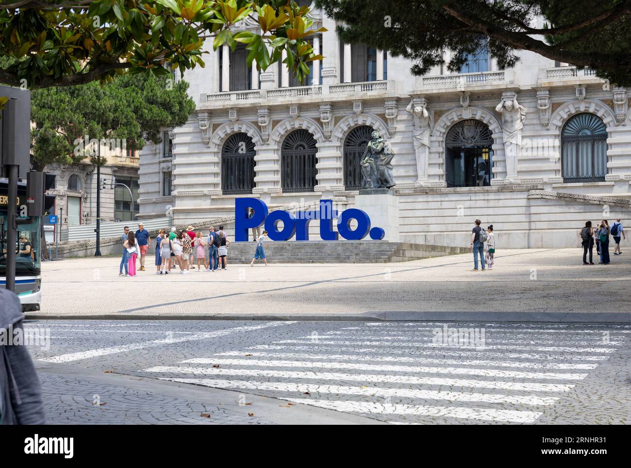 Porto, Portugal - 31.05.2023: Tourists in front of the blue letters of Porto  sign with the Porto City Hall facade in the background. City of Porto, Po  Stock Photo - Alamy