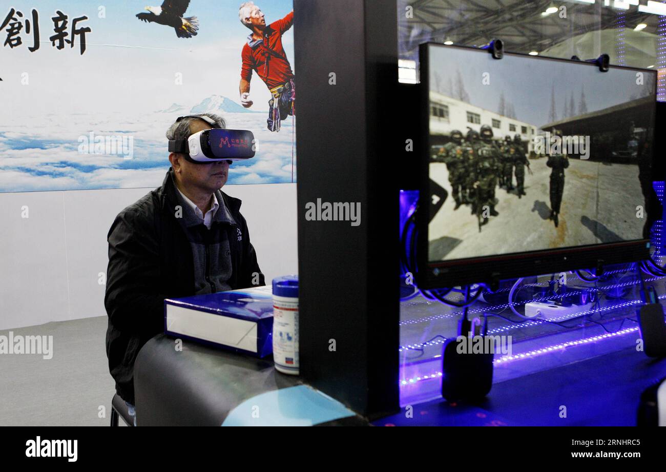 (161207) -- SHANGHAI, Dec. 7, 2016 -- A visitor tries VR glasses at the National Association of Broadcasters (NAB) Show Shanghai held in east China s Shanghai, Dec. 7, 2016. Building on the strength and success of the NAB Show brand and its global influence, Shanghai s show is the premier event for the broadcast and transmedia industry in the Asia and Pacific region. ) (wx) CHINA-SHANGHAI-NAB SHOW (CN) FangxZhe PUBLICATIONxNOTxINxCHN   Shanghai DEC 7 2016 a Visitor tries VR Glasses AT The National Association of Broadcasters NAB Show Shanghai Hero in East China S Shanghai DEC 7 2016 Building O Stock Photo