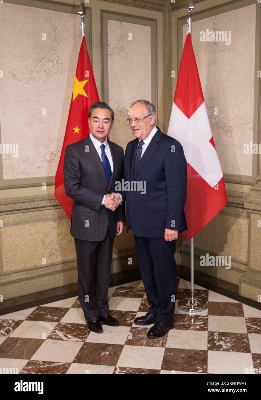(161212) -- BERN, Dec. 12, 2016 -- Chinese Foreign Minister Wang Yi (L) shakes hands with Swiss President Johann Schneider-Ammann in Bern, Switzerland, on Dec. 12, 2016. ) SWITZERLAND-CHINA-FM-VISIT XuxJinquan PUBLICATIONxNOTxINxCHN   161212 Berne DEC 12 2016 Chinese Foreign Ministers Wang Yi l Shakes Hands With Swiss President Johann Schneider Ammann in Berne Switzerland ON DEC 12 2016 Switzerland China FM Visit XuxJinquan PUBLICATIONxNOTxINxCHN Stock Photo