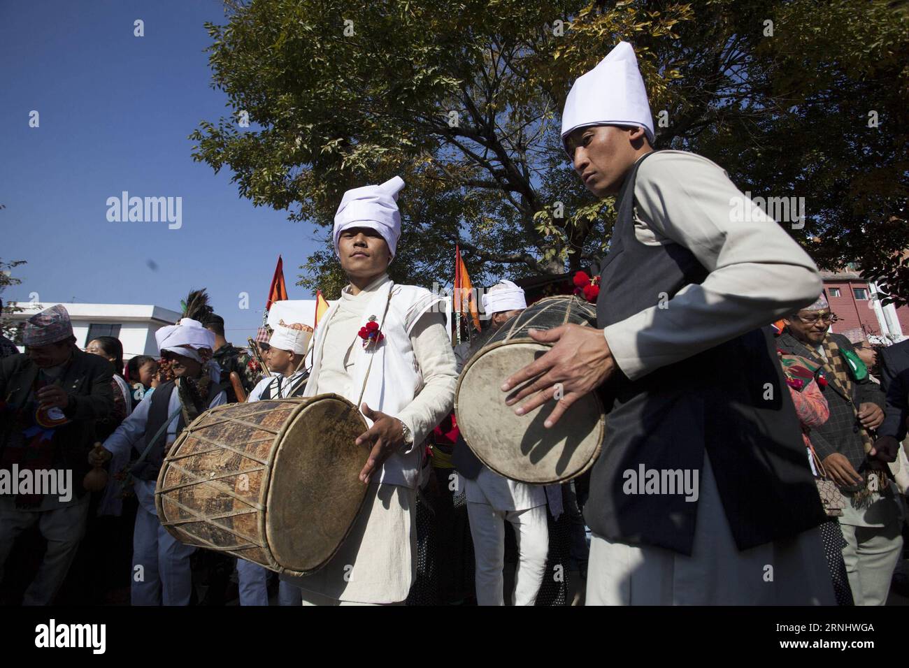 (161213) -- LALITPUR, Dec. 13, 2016 -- Nepalese people from Kirat community in traditional costumes play drums to celebrate Udhauli festival in Lalitpur, Nepal, Dec. 13, 2016. Udhauli is the annual festival celebrated by Kirat community of eastern Nepal marking the migration of animals and birds to low altitude towards warmer regions as the winter coming. ) (hy) NEPAL-LALITPUR-UDHAULI FESTIVAL PratapxThapa PUBLICATIONxNOTxINxCHN   Lalitpur DEC 13 2016 Nepalese Celebrities from Kirat Community in Traditional Costumes Play Drums to Celebrate Udhauli Festival in Lalitpur Nepal DEC 13 2016 Udhauli Stock Photo