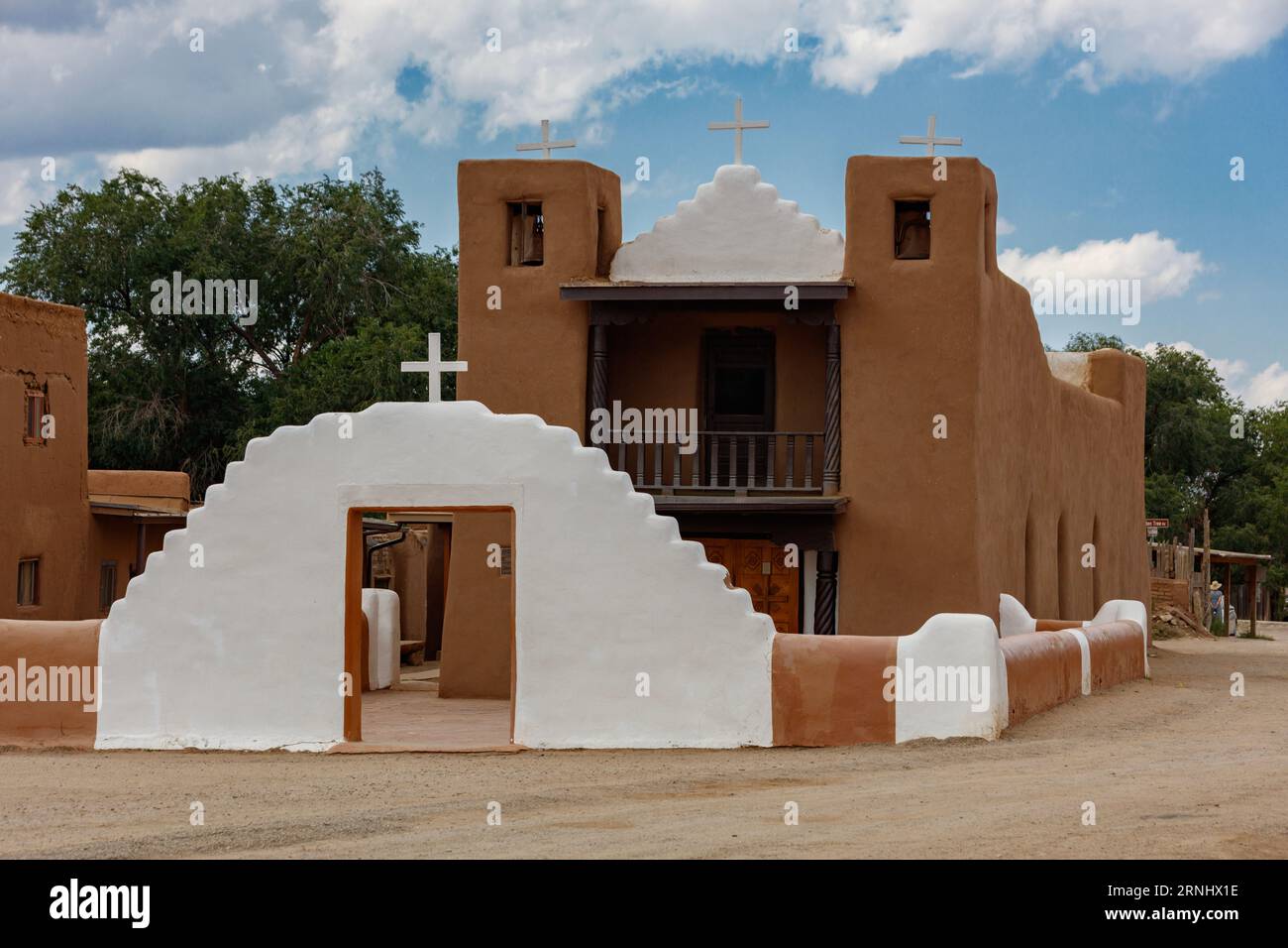 The Catholic San Francisco de Assisi Mission Church at the Taos Pueblo  was built starting in 1772- New Mexico Stock Photo