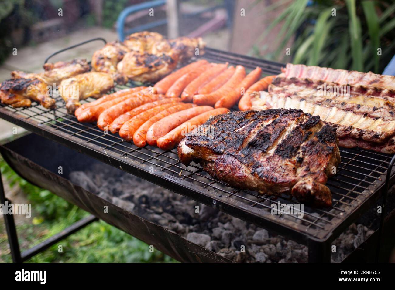 Chilean celebration of the national holidays includes roasts, meats and chickens that are eaten on fire as part of the traditions of Chile Stock Photo