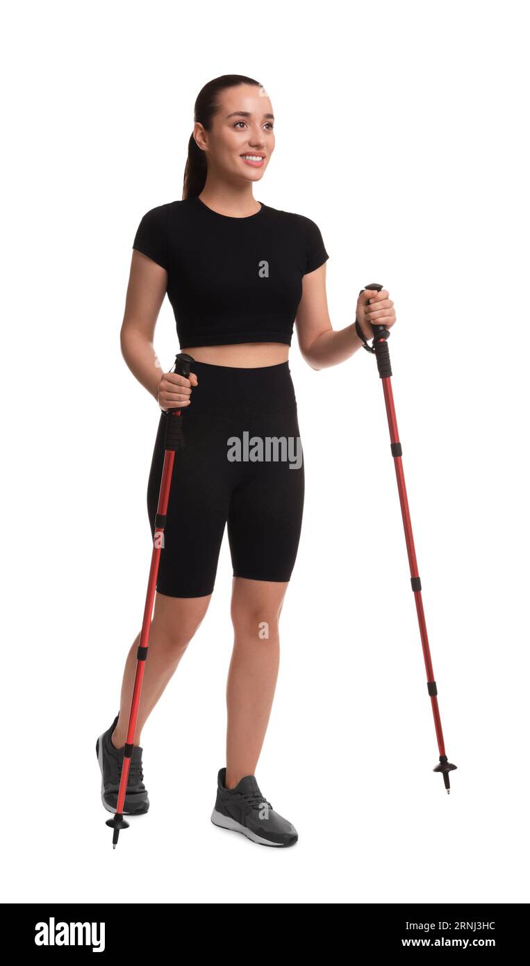 Woman with poles for Nordic walking isolated on white Stock Photo
