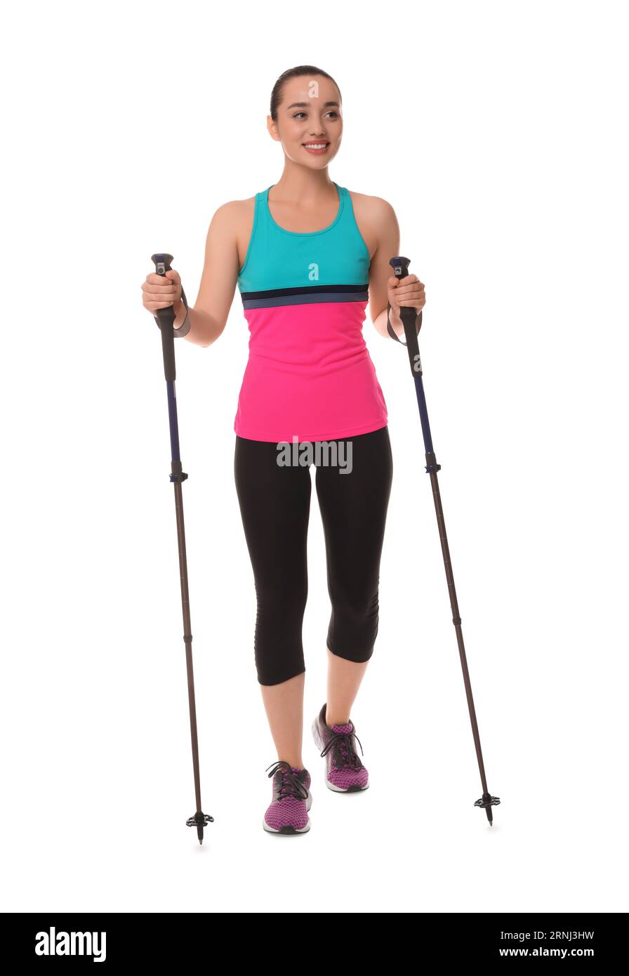 Young woman practicing Nordic walking with poles isolated on white Stock Photo