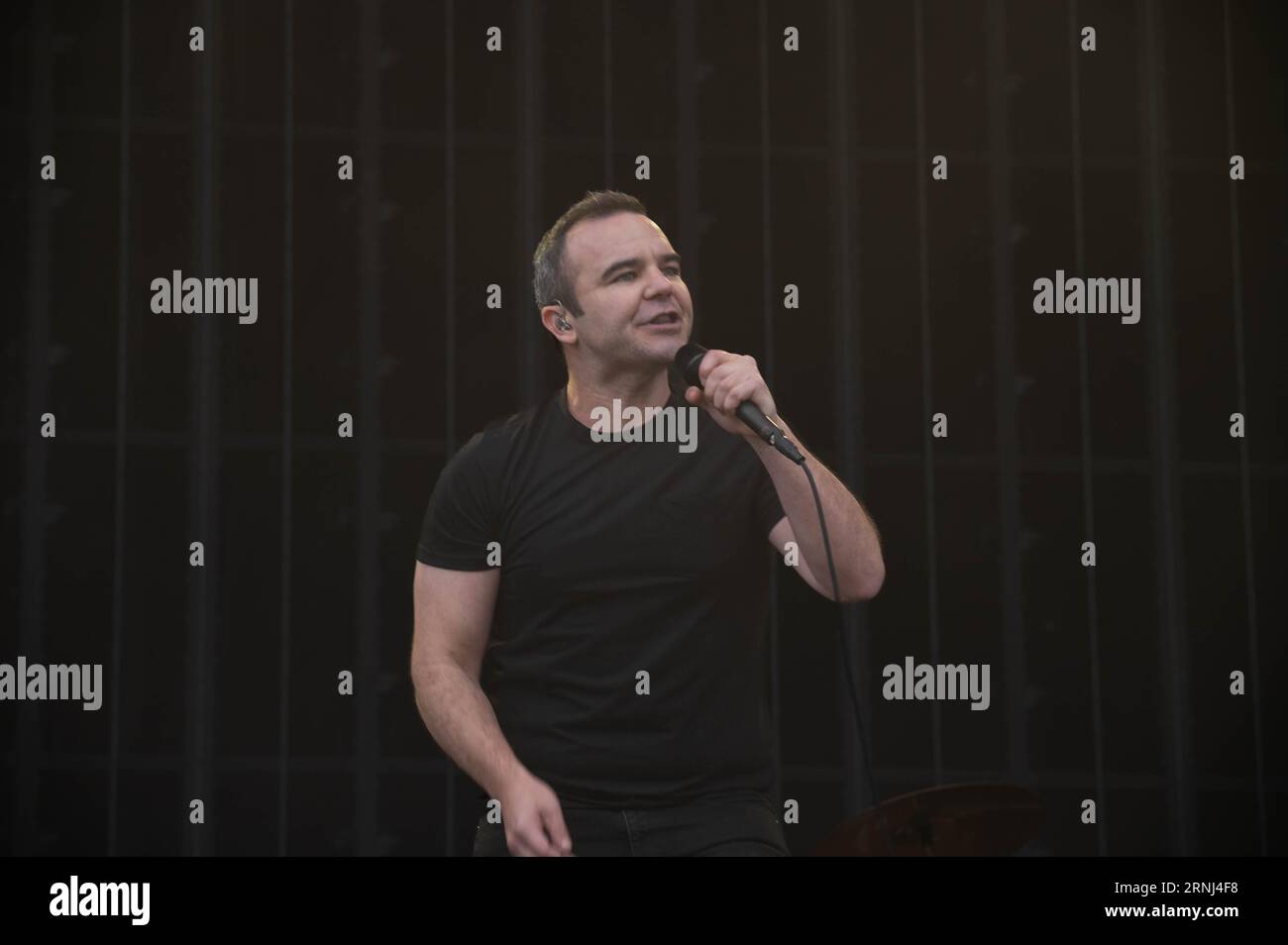 Photographs of Samuel T Herring of Future Islands performing at Connect