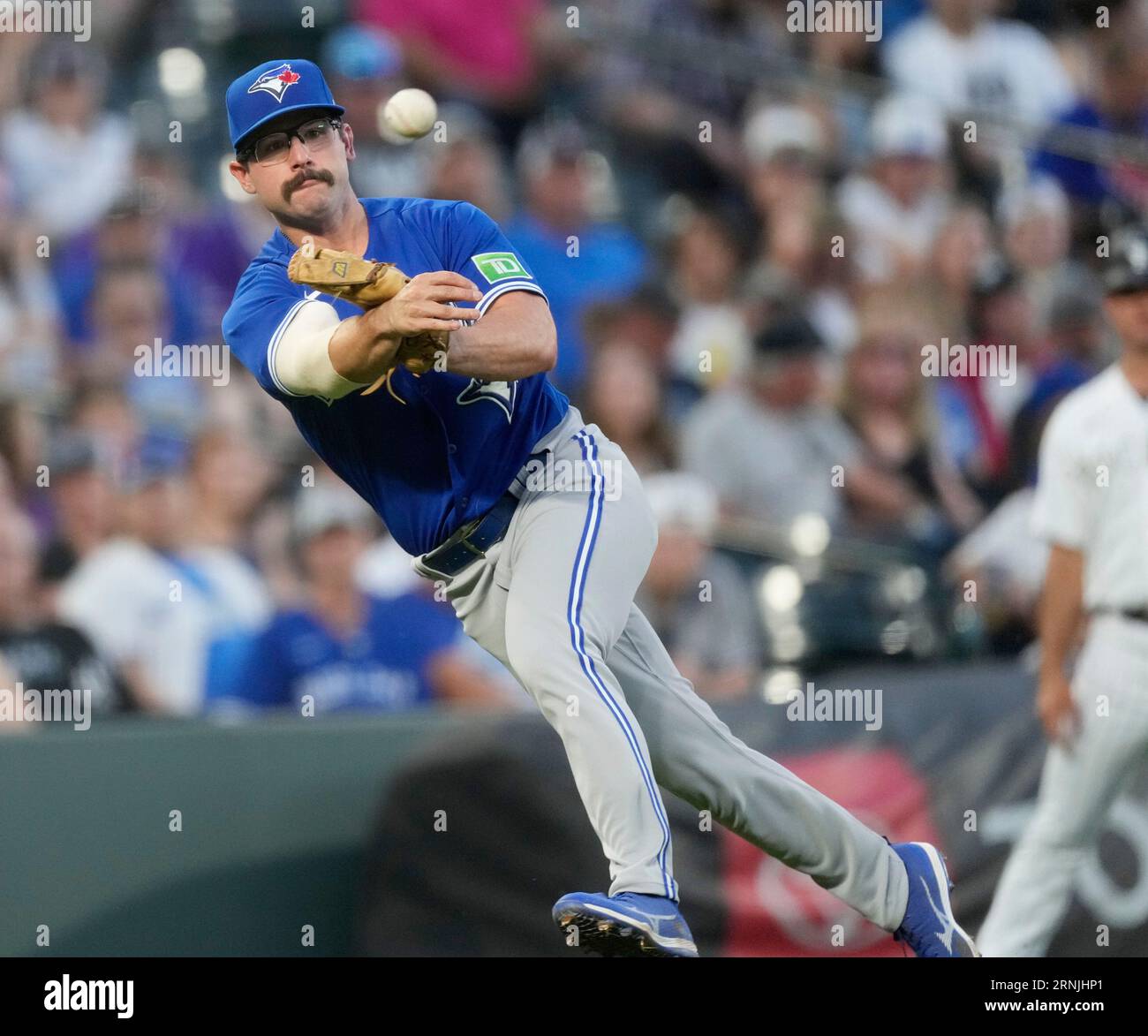 Toronto Blue Jays Third Baseman Davis Schneider Throws To First For The ...